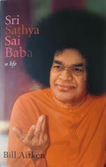 Paperback book titled Sri Sathya Sai Baba a life by Bill Aitken with portrait of Sai Baba