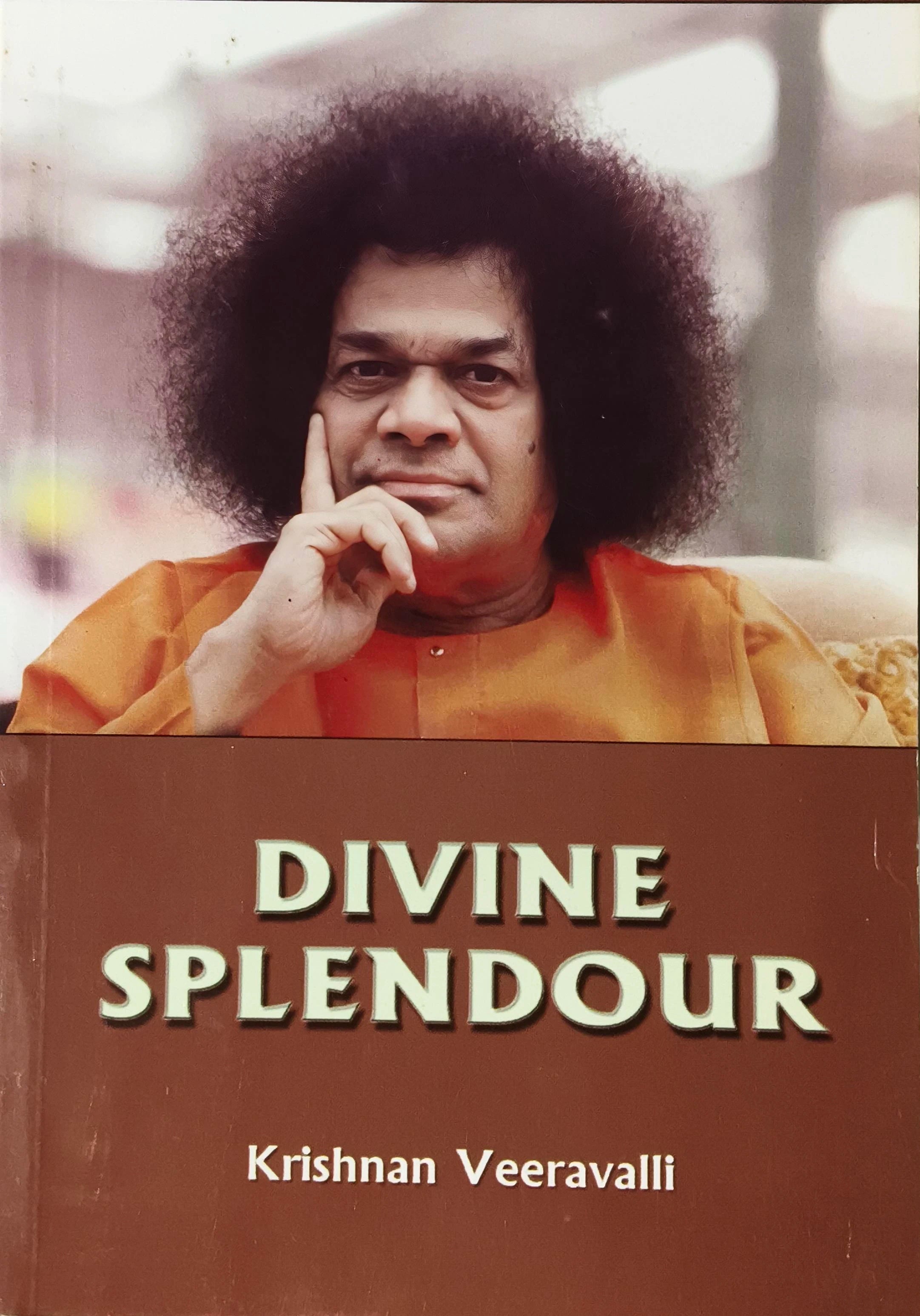 Book cover of Divine Splendour by Krishnan Veeravalli featuring a portrait of a man in orange clothing