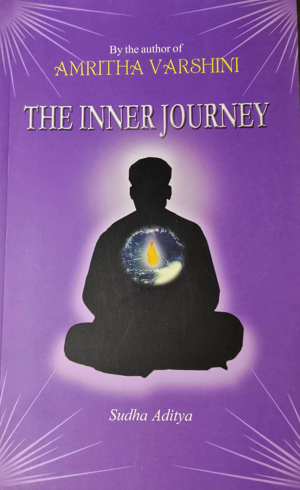Paperback book The Inner Journey by Sudha Aditya with purple cover and meditating silhouette
