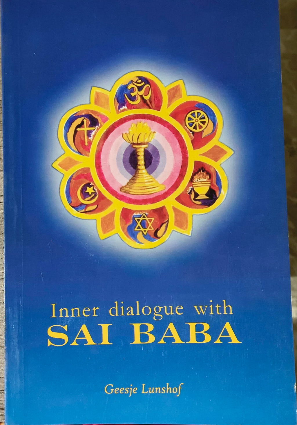 Paperback book Inner Dialogue with Sai Baba by Geesje Lunshof with blue cover