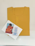 Yellow Swamy robe folded with white napkins and packets of vibhuthi