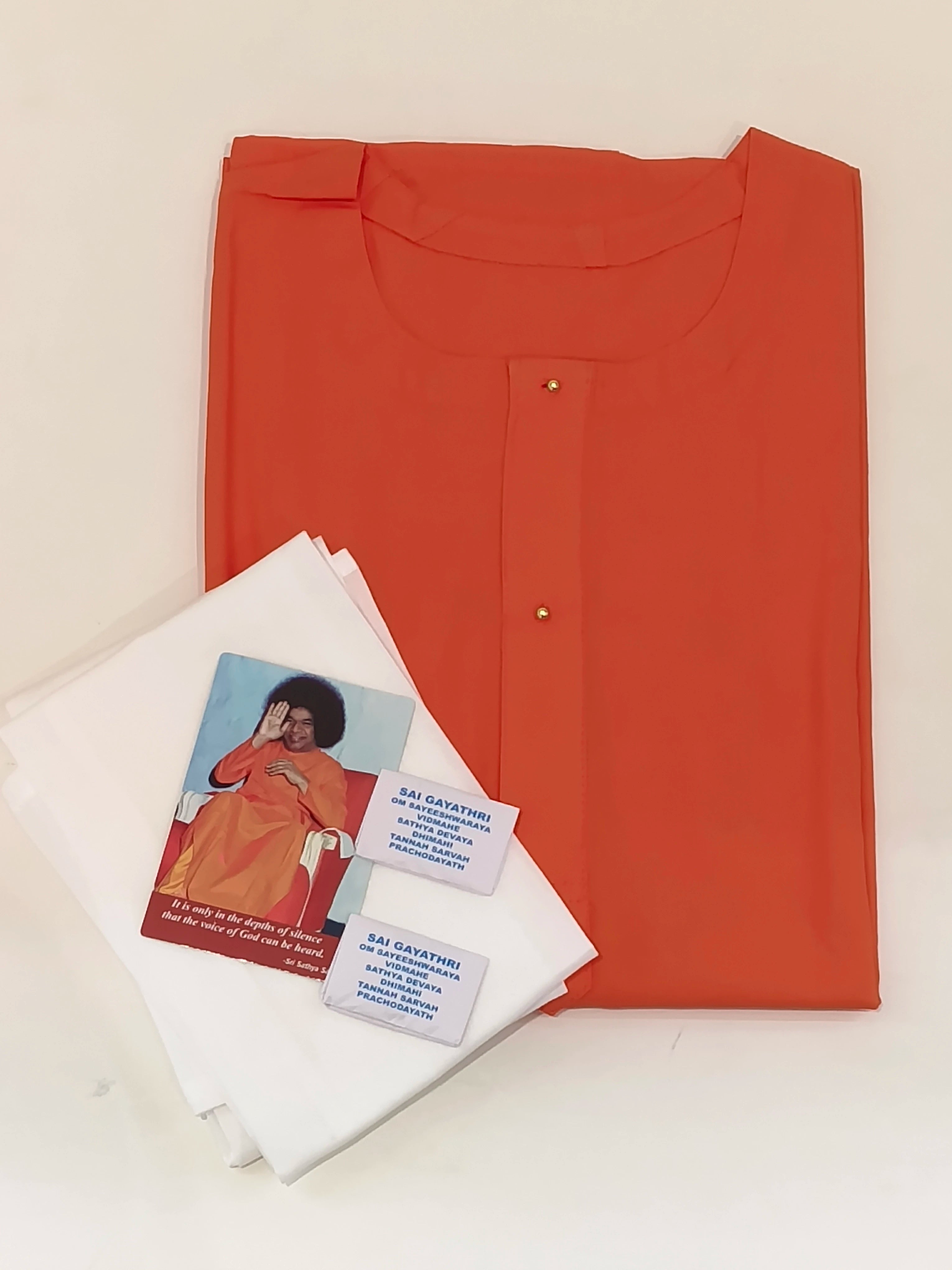 Folded orange swamy robe with two white napkins, two vibhuthi packets, and Sai Baba prayer card