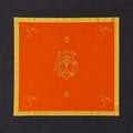 Orange medium pooja table cloth with golden border and spiritual symbols
