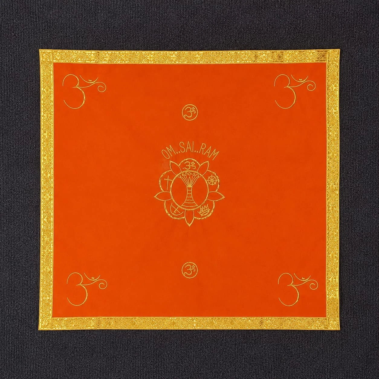 Orange medium pooja table cloth with golden border and spiritual symbols