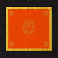 Small orange pooja table cloth with golden border and spiritual symbols