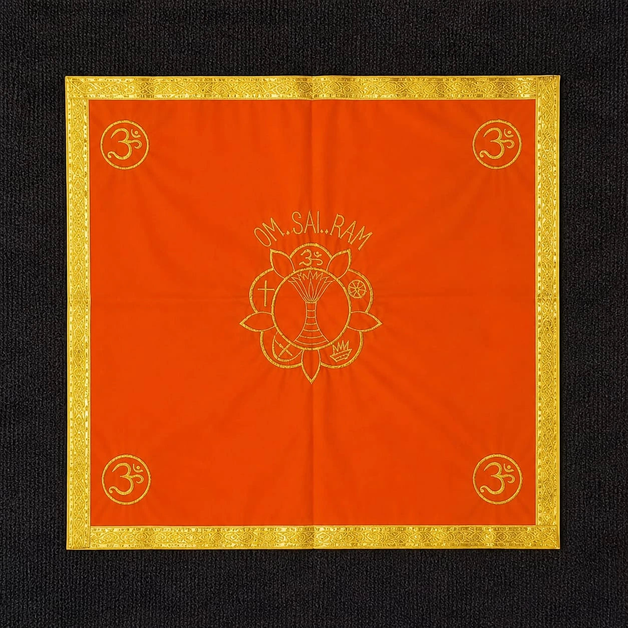Small orange pooja table cloth with golden border and spiritual symbols