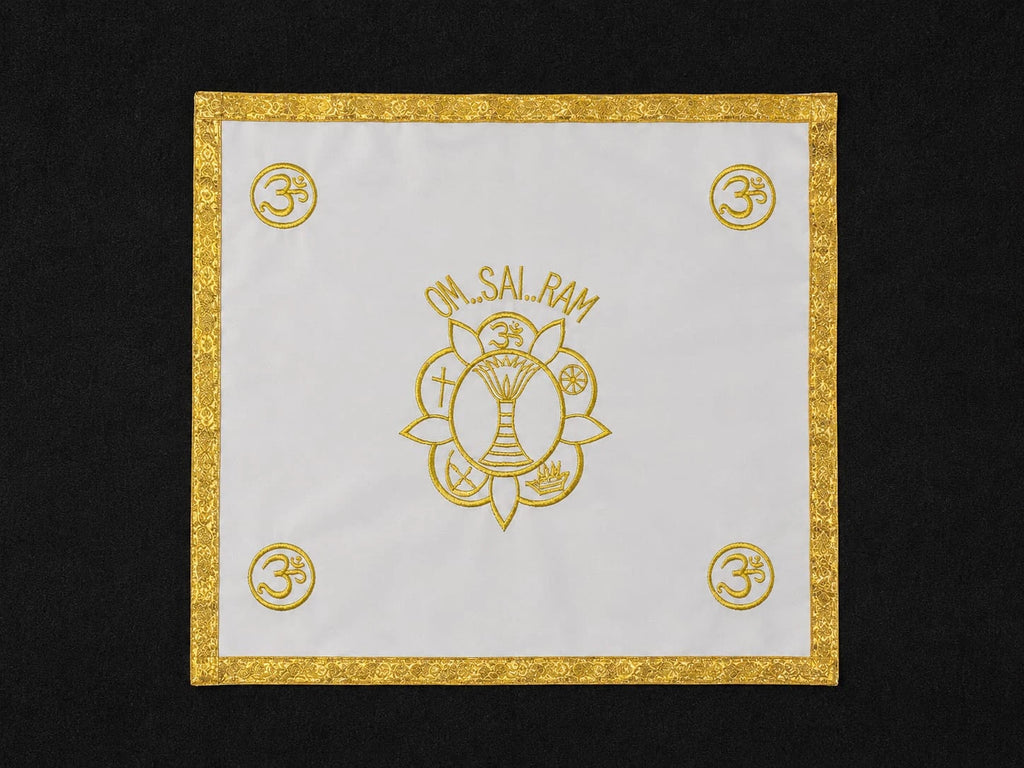 Small white pooja table cloth with gold border and spiritual symbols embroidered