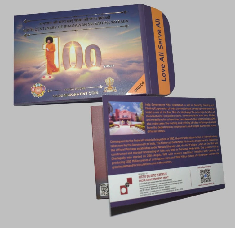 Sai Baba Centenary commemorative coin with detailed packaging and information card