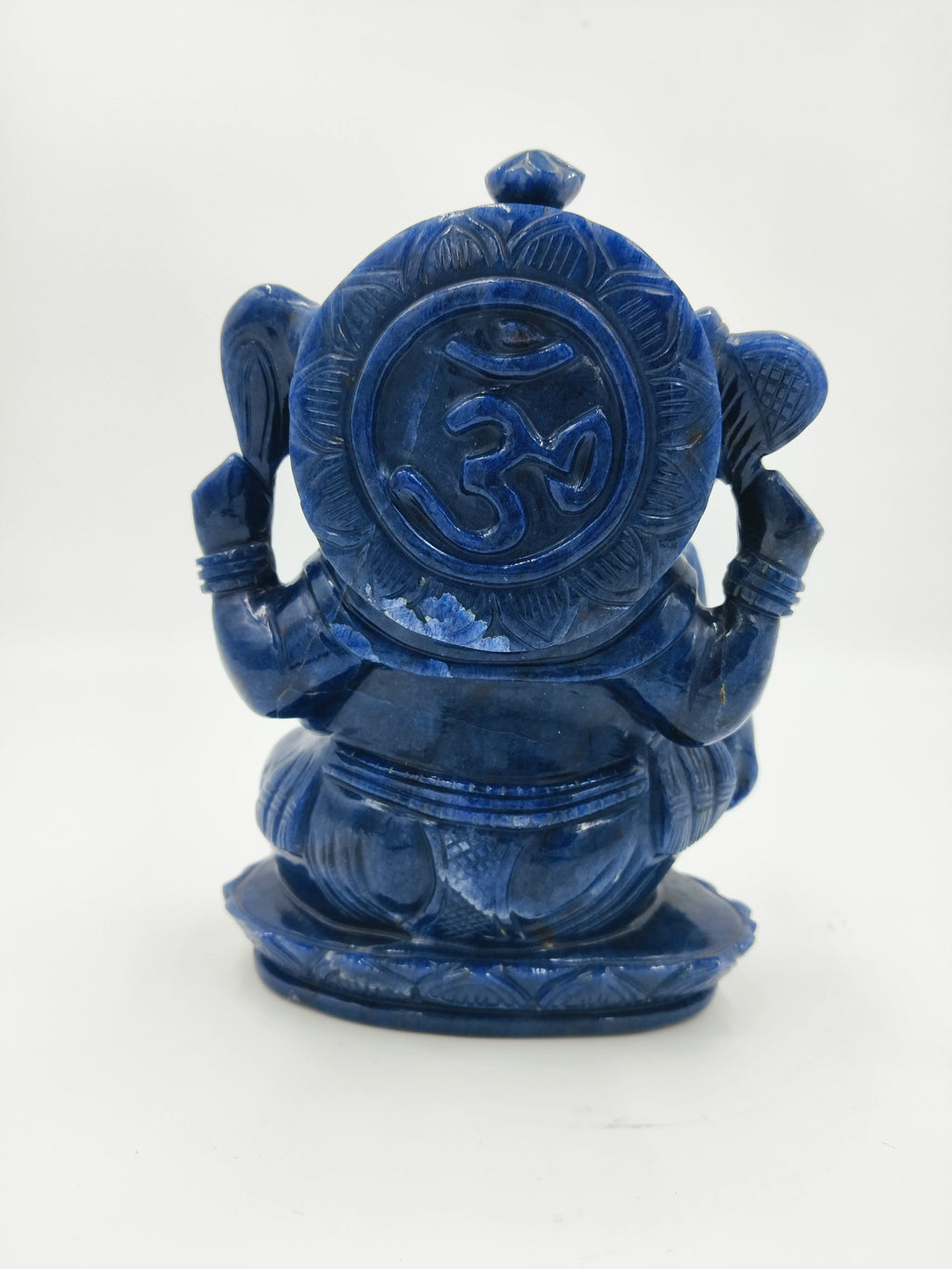 Back view of blue jade Ganesh statue with Om symbol carving