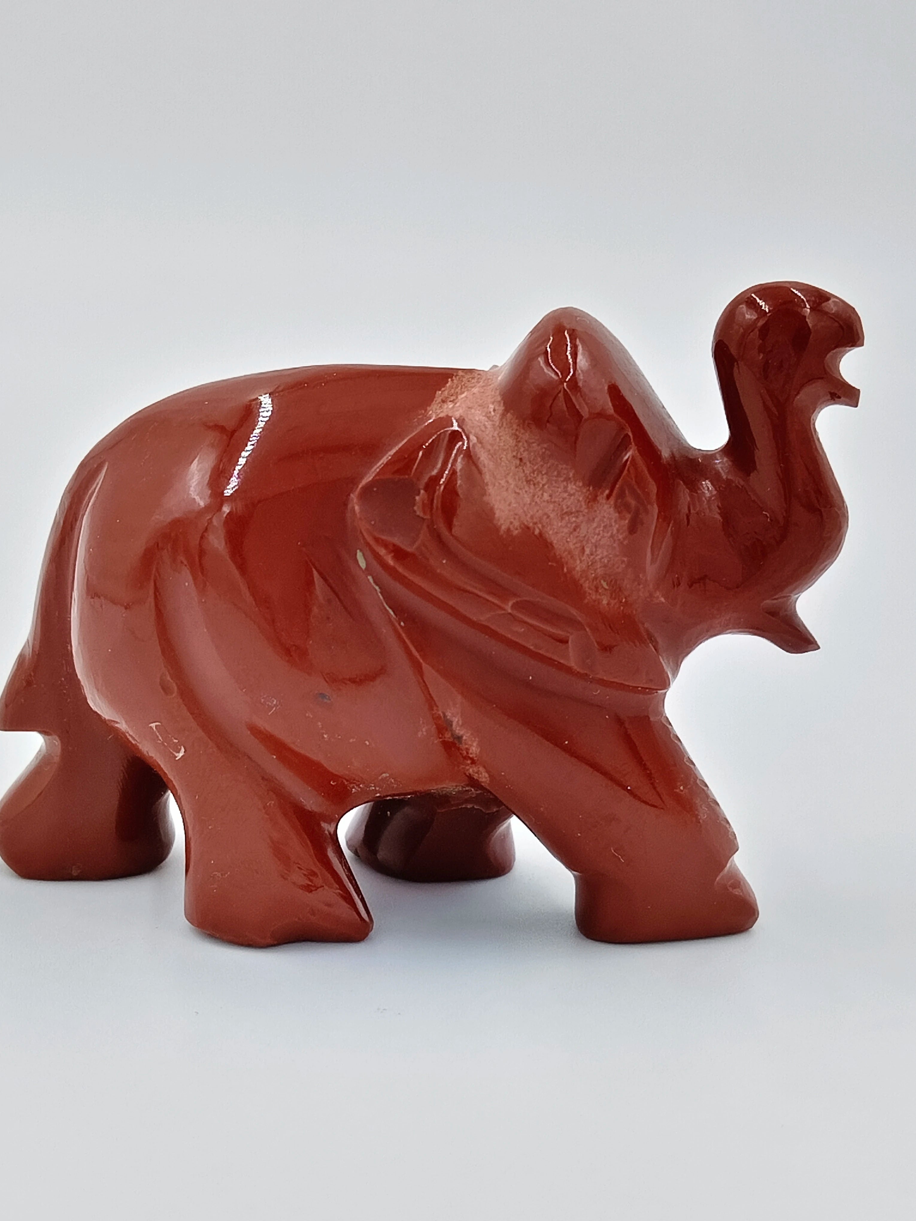 Mini red jasper elephant sculpture figurine side view