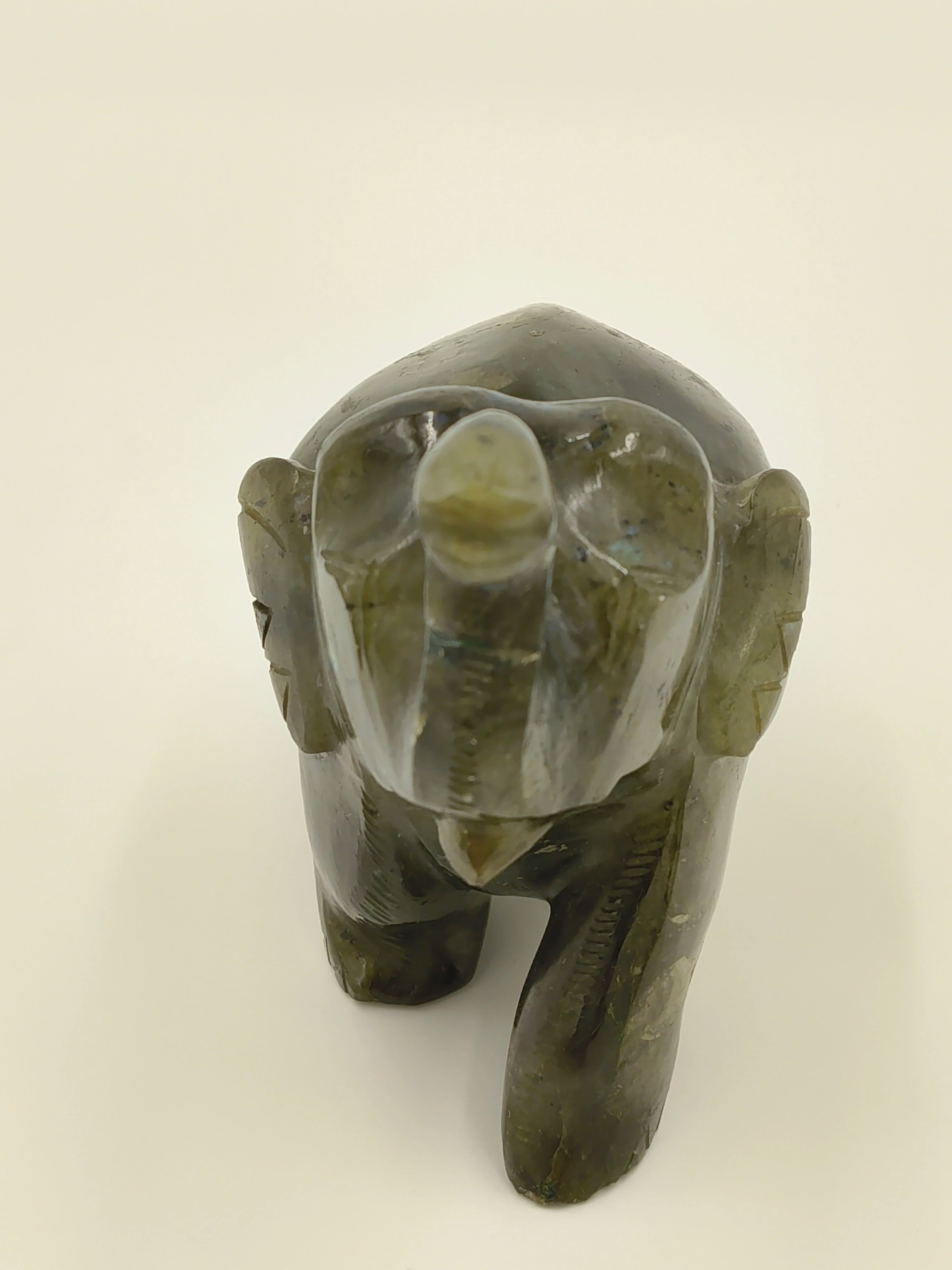 Front view of small labradorite elephant sculpture for tabletop decor