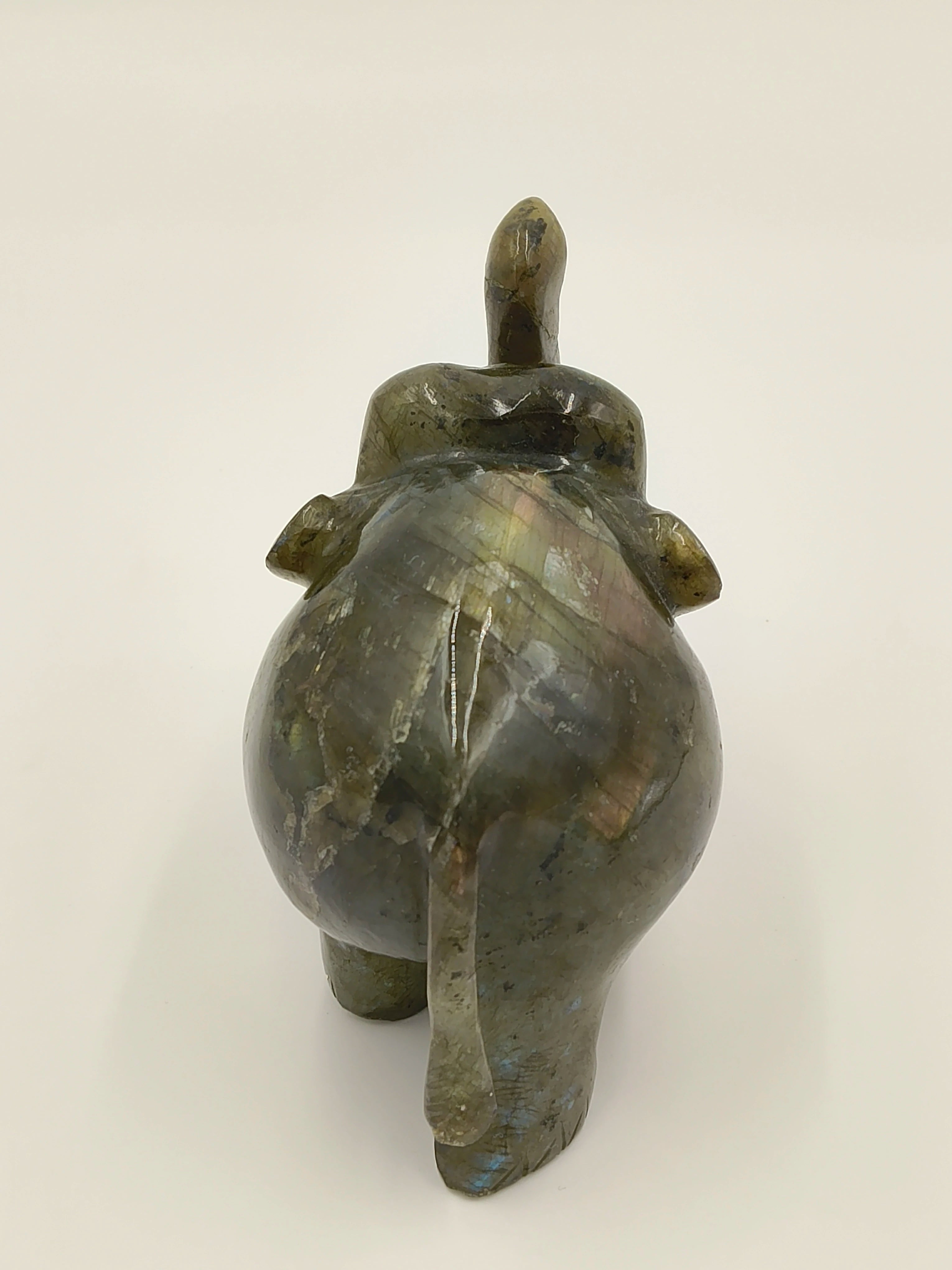 Back view of small labradorite elephant figurine sculpture
