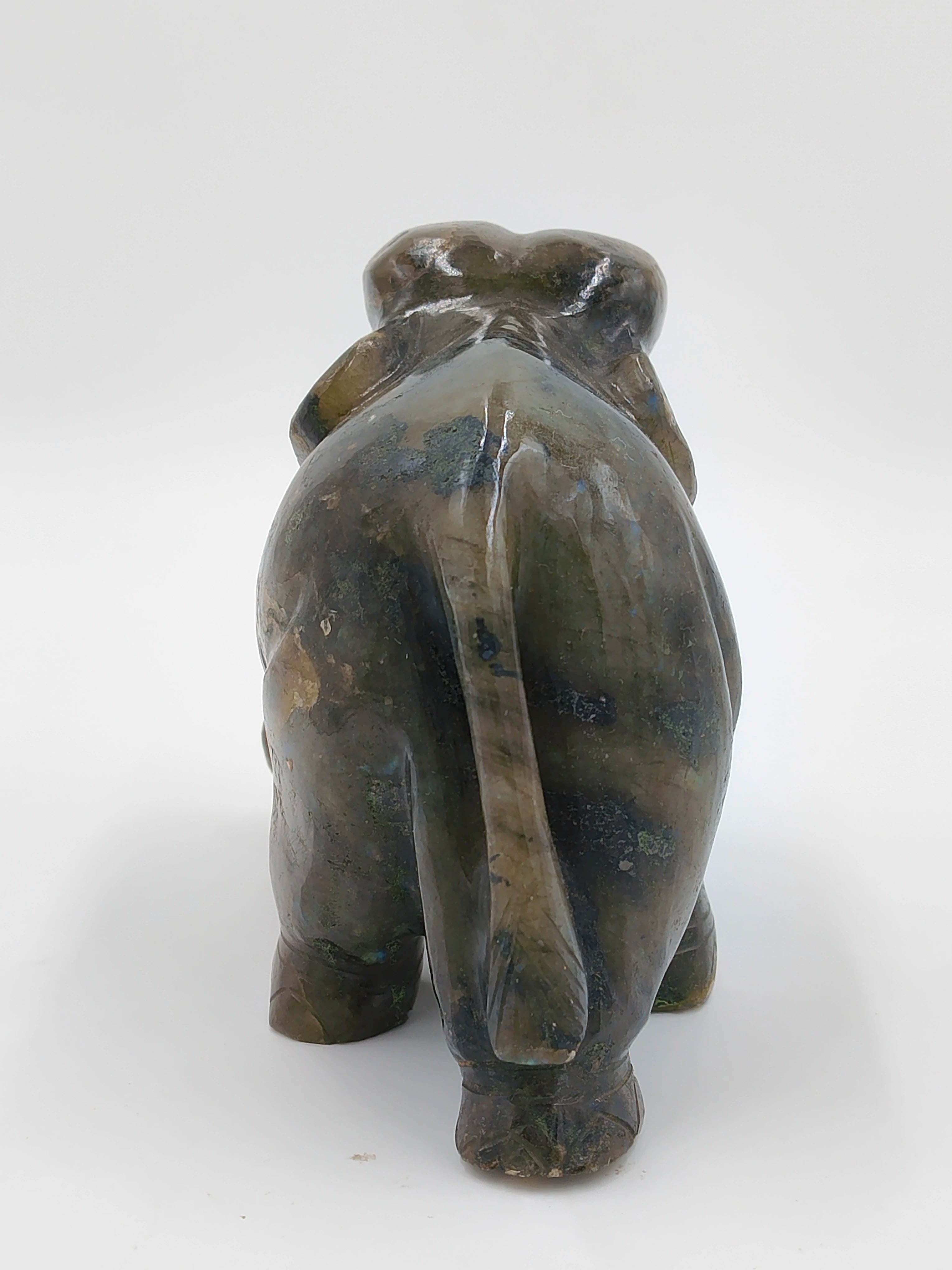Rear view of labradorite elephant figurine sculpture