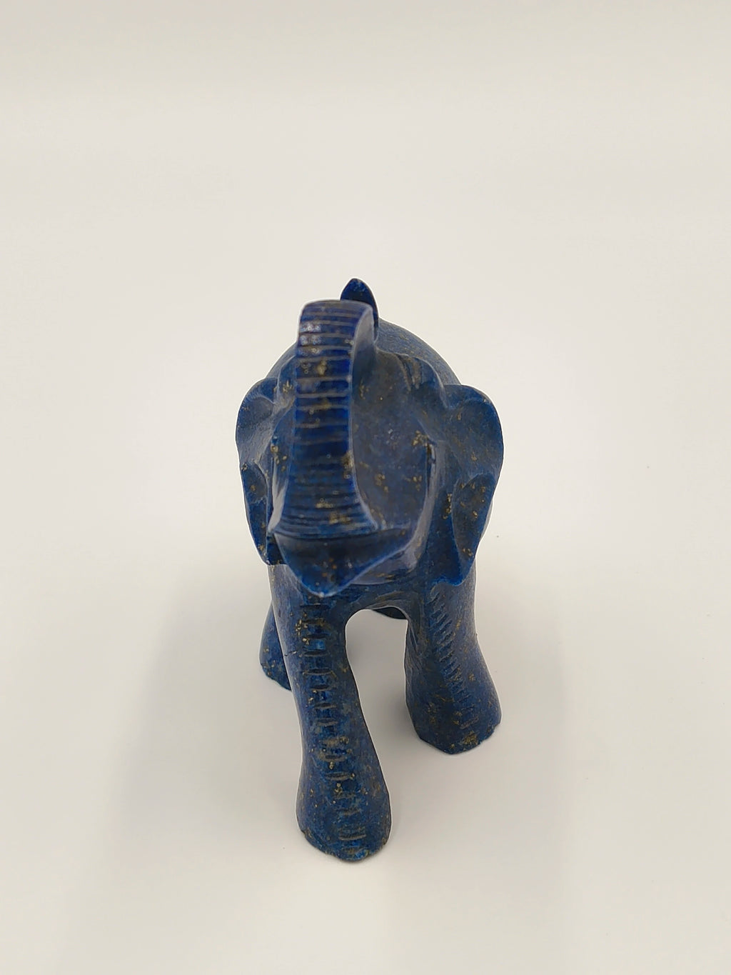 Small blue lapis elephant figurine sculpture front view