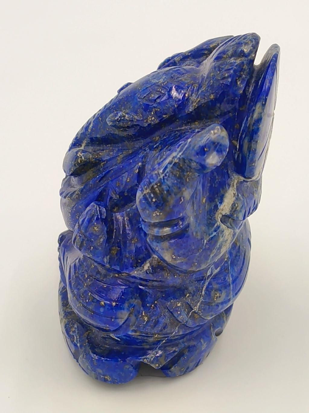 Small blue lapis Ganesh statue with intricate carved details