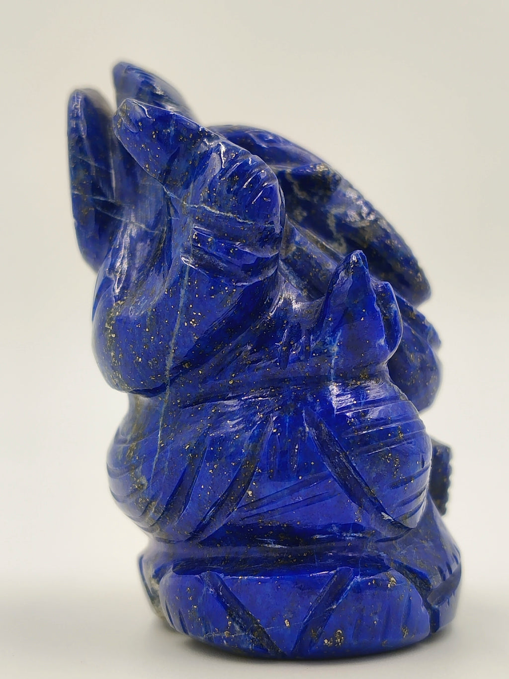 Side view of a 1.9 inch lapis lazuli Ganesh statue sculpture