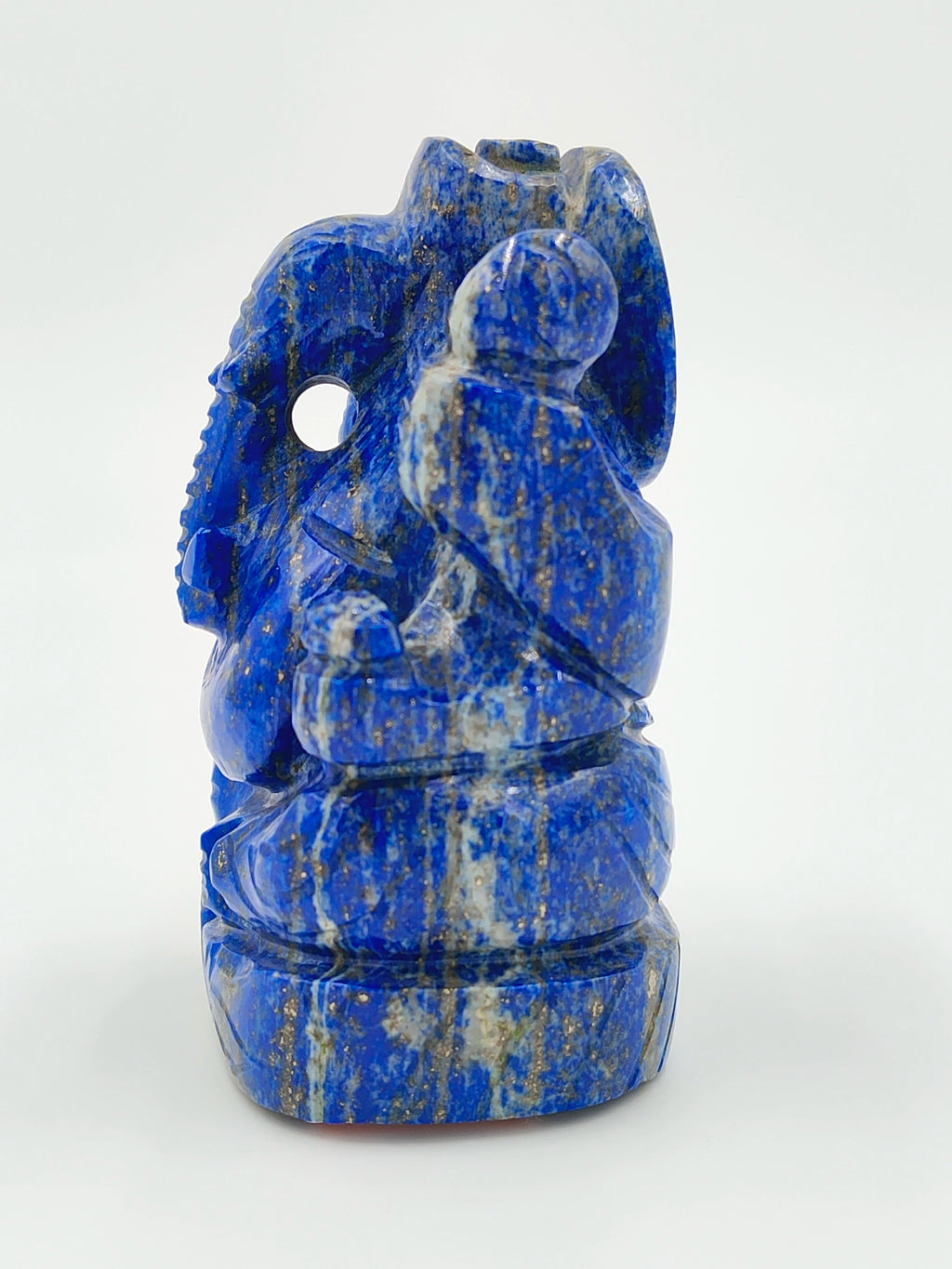 Small lapis lazuli Ganesh statue with intricate carvings, side view