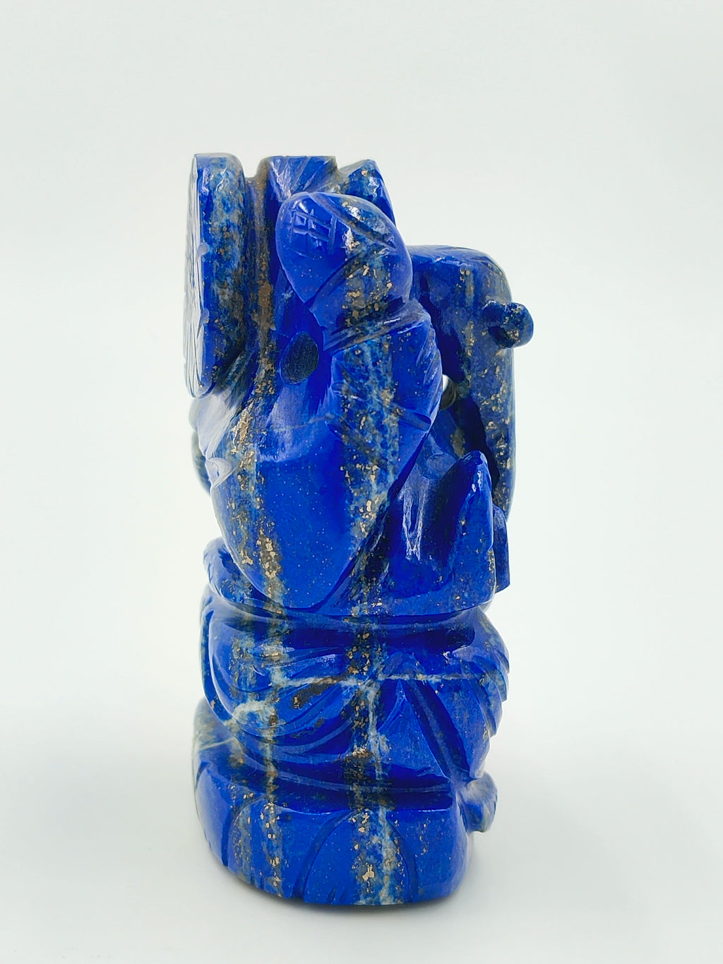Side view of a blue lapis lazuli Ganesh statue sculpture