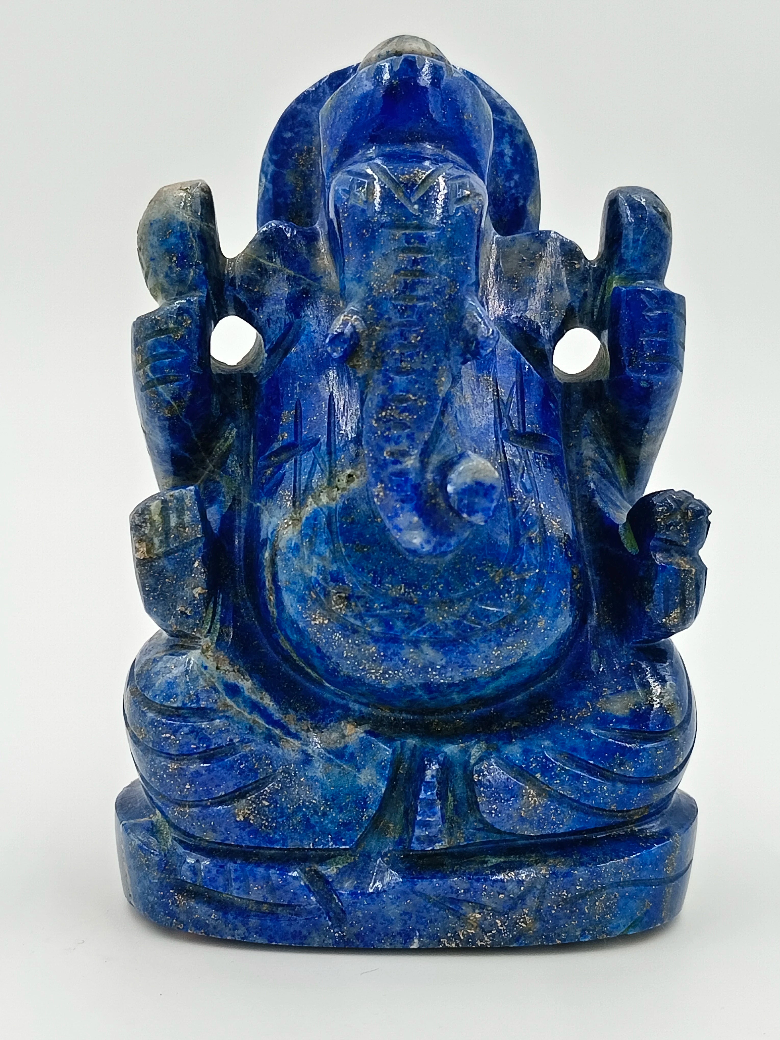 Small blue lapis lazuli Ganesh statue seated in meditation pose