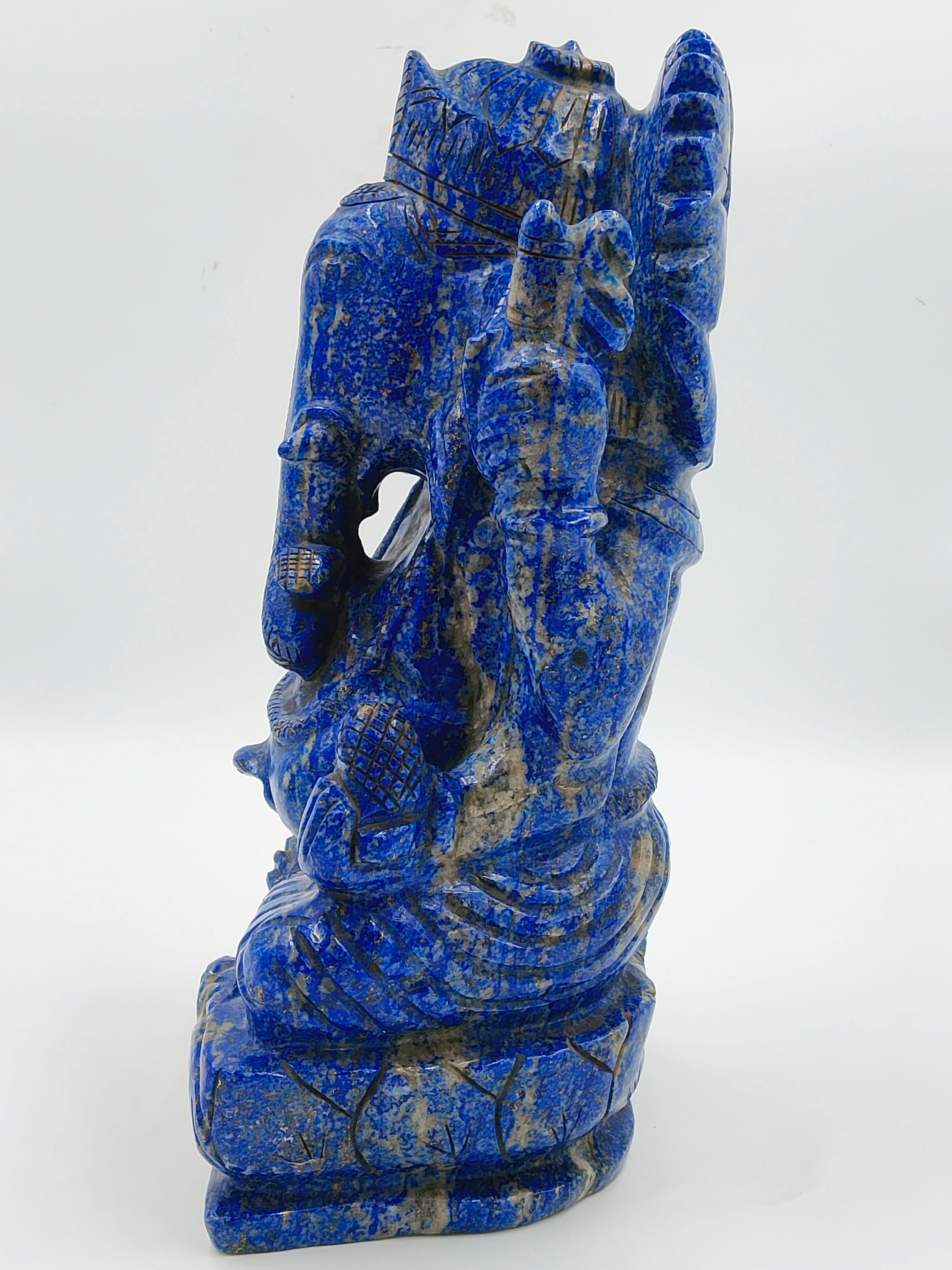 Side view of 11-inch Ganesh sculpture carved from blue lapis stone