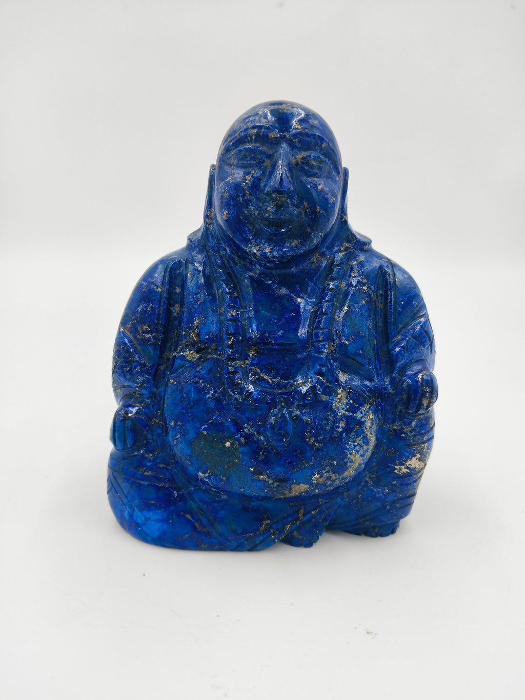 Front view of a 4.3-inch Laughing Buddha sculpture carved from lapis stone