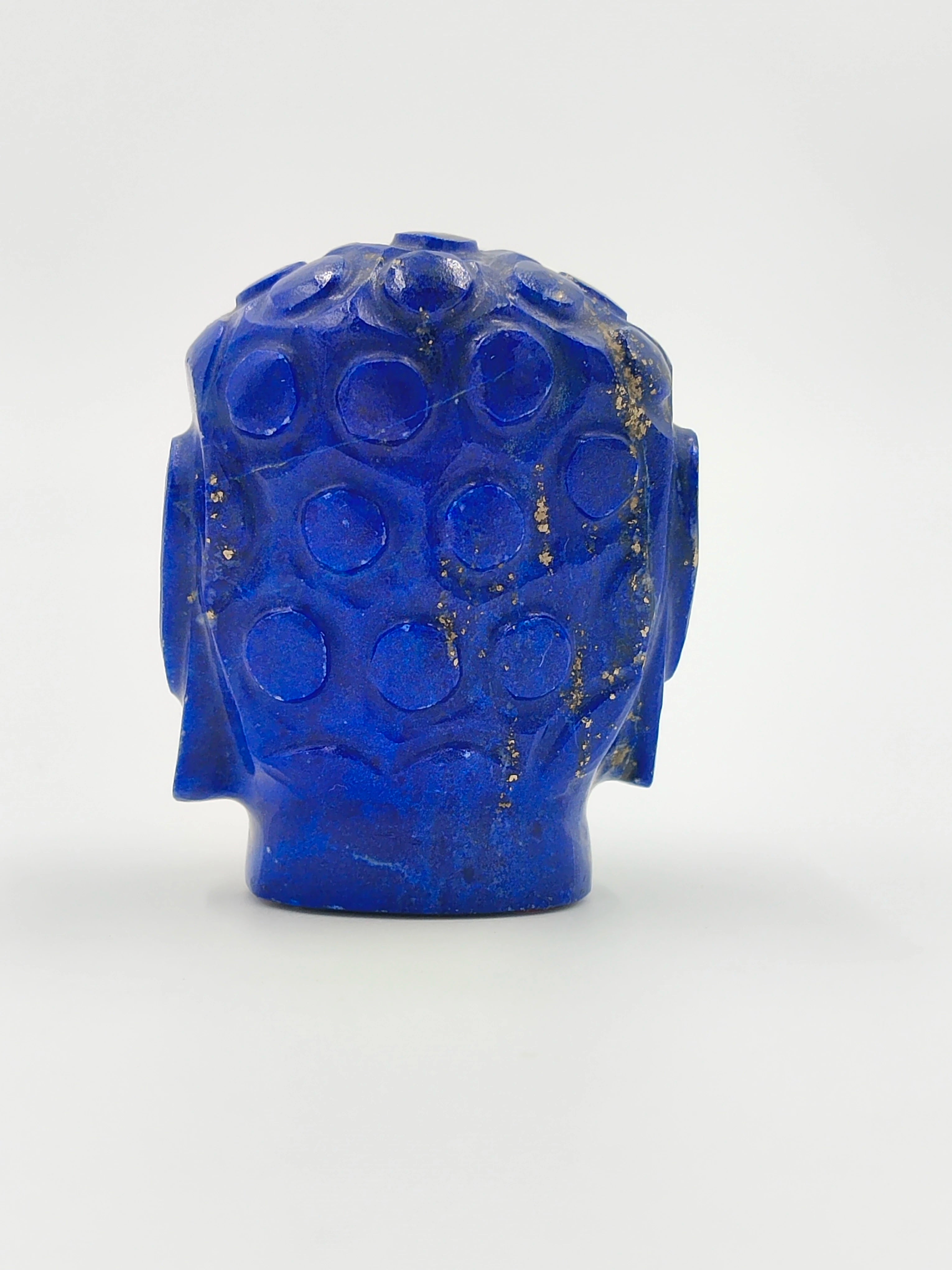Rear view of a 1.3 inch lapis lazuli Buddha head sculpture