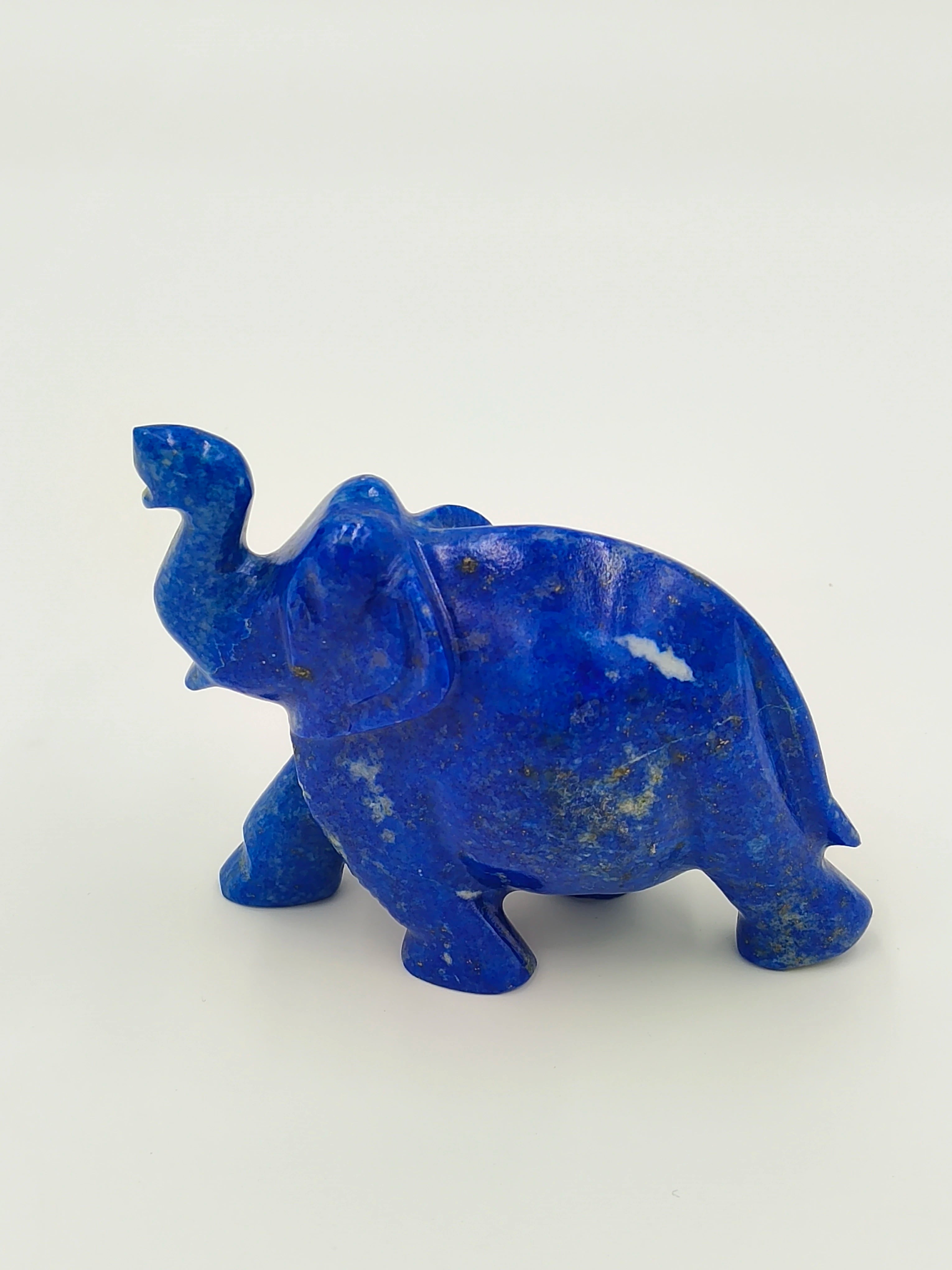 Small blue lapis elephant figurine sculpture with raised trunk