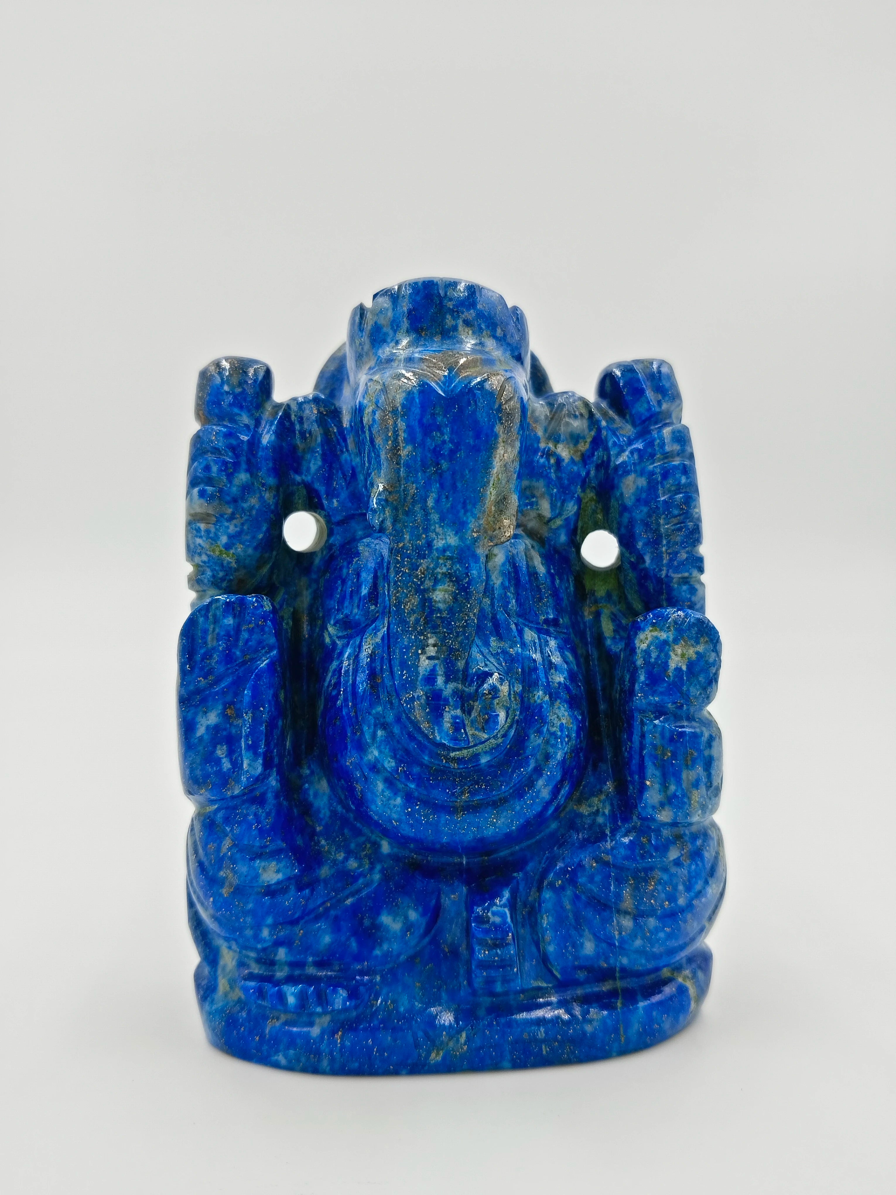 Blue lapis lazuli Ganesh statue carved in detailed small tabletop sculpture