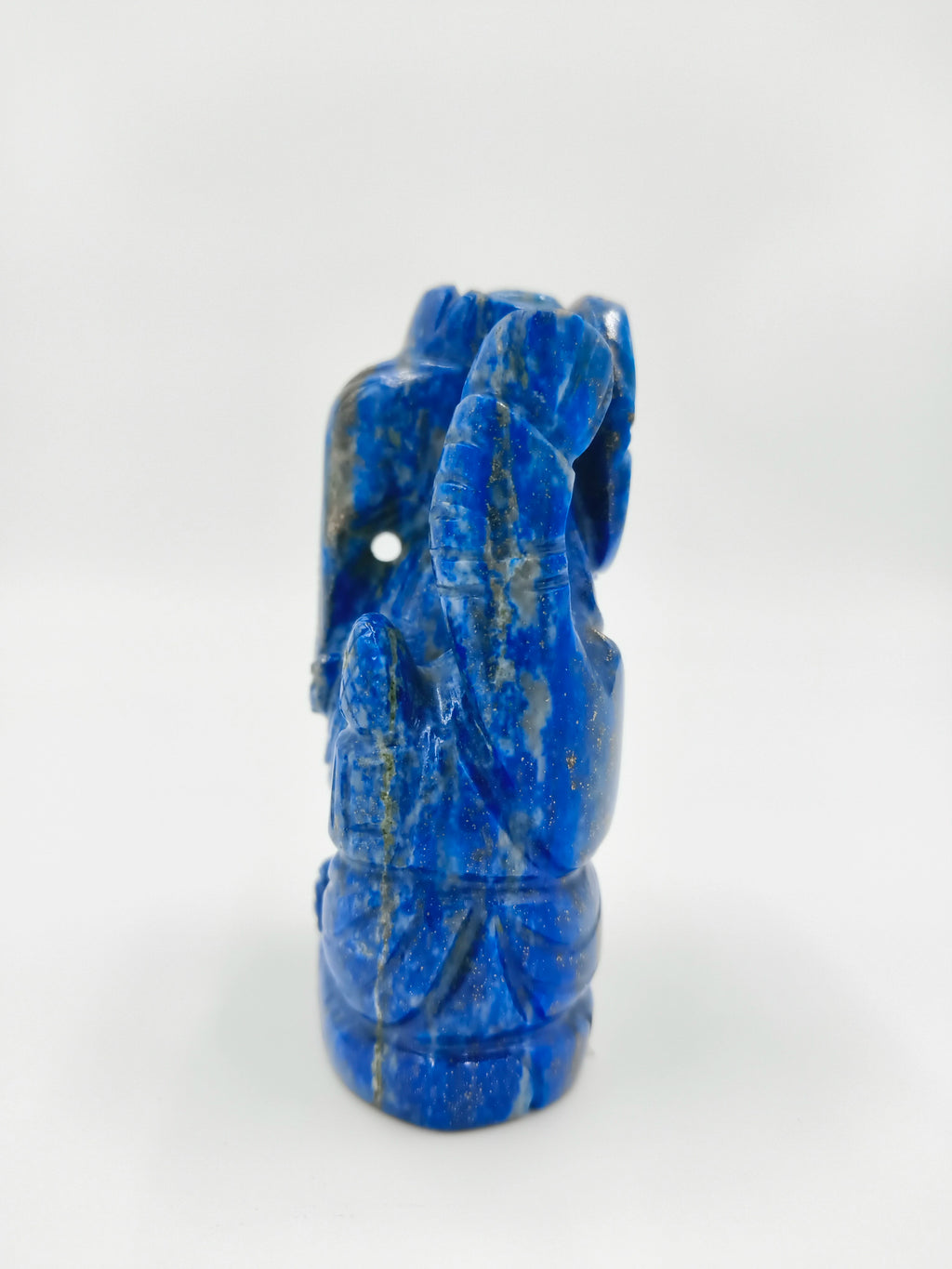 Side view of small blue lapis lazuli Ganesh sculpture