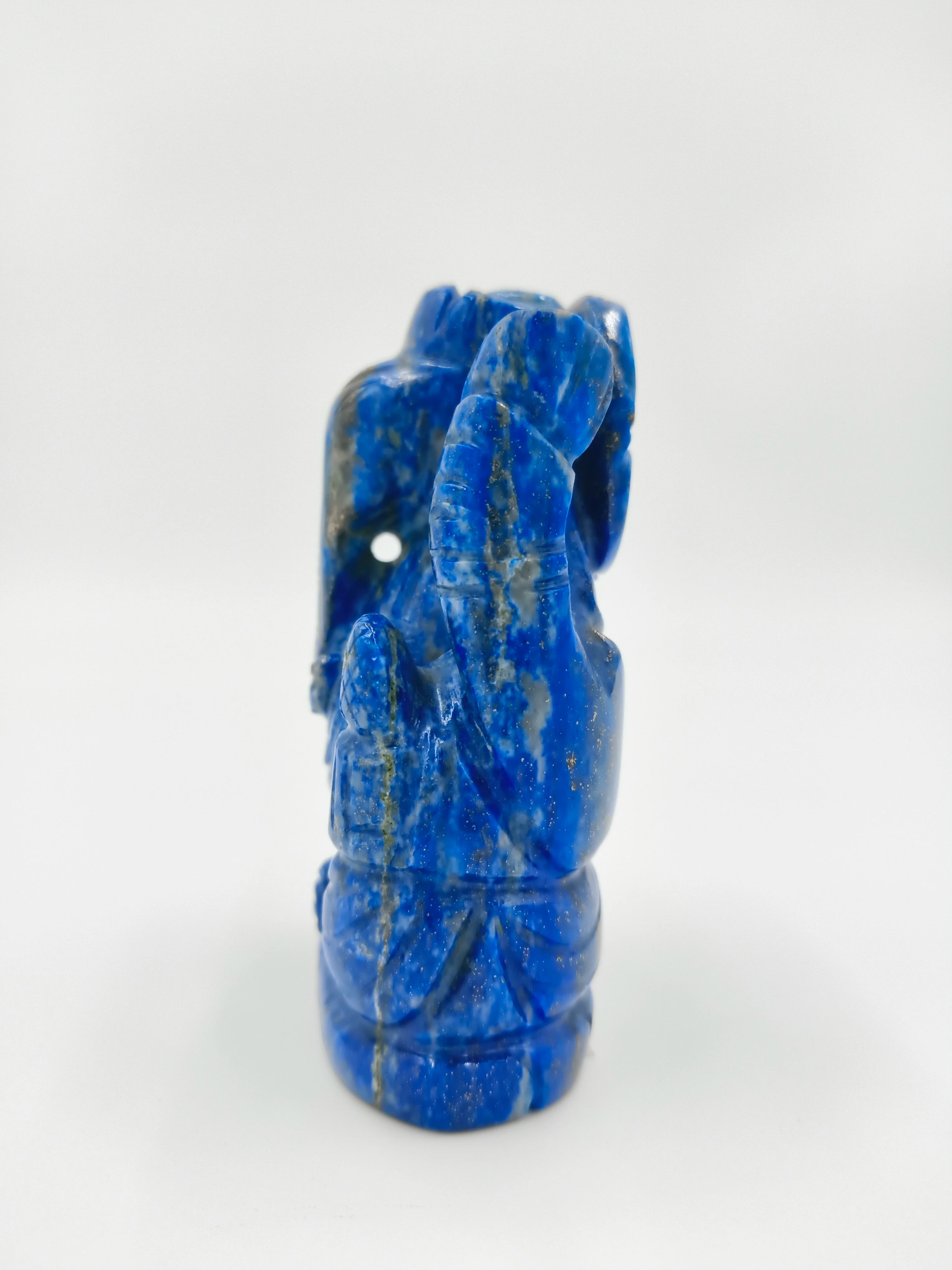 Side view of small blue lapis lazuli Ganesh sculpture