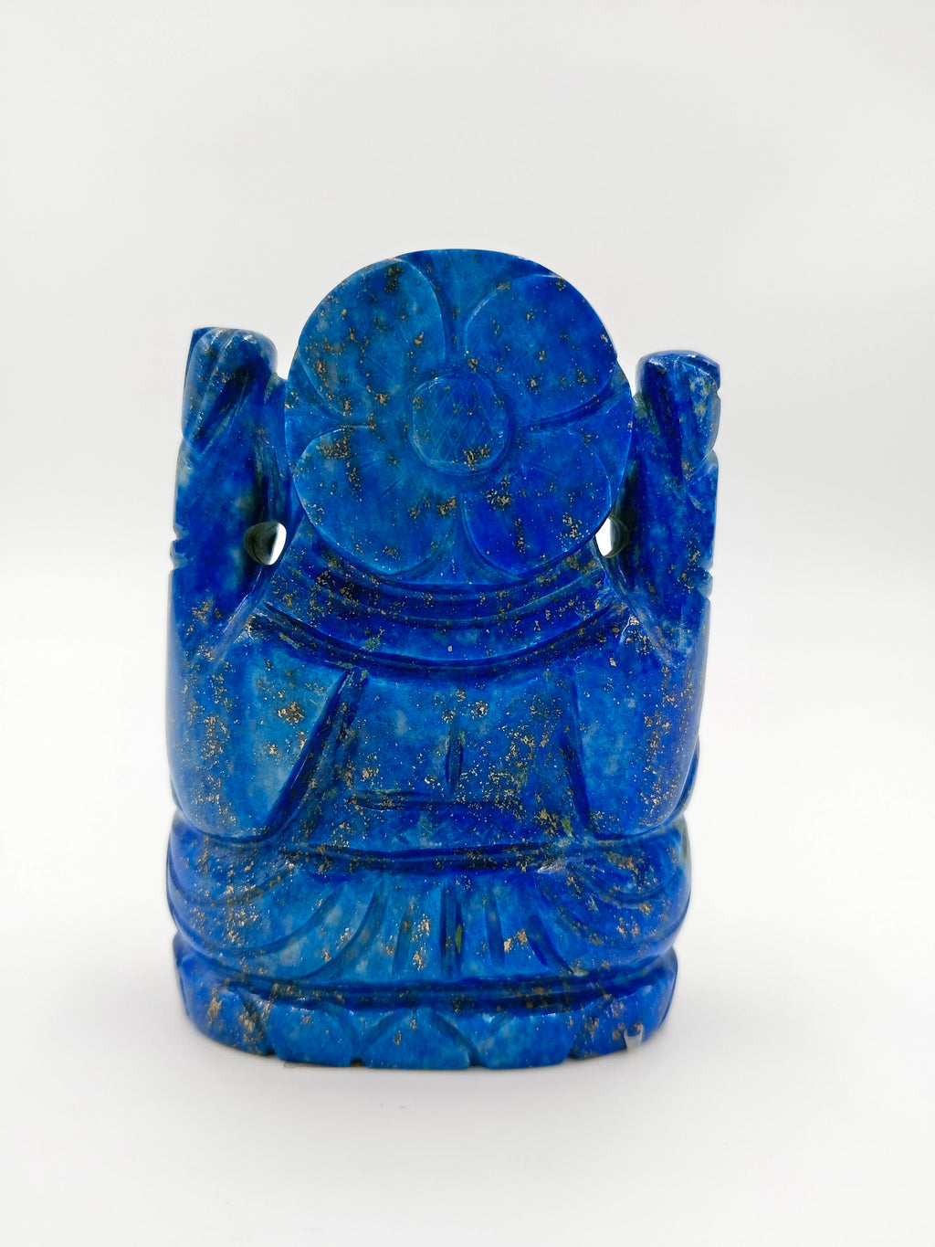 Back view of small lapis lazuli Ganesh statue with floral details