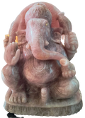Rose quartz statue of Ganesh deity seated with detailed carvings