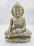 Front view of serpentine stone Buddha statue seated in meditation pose