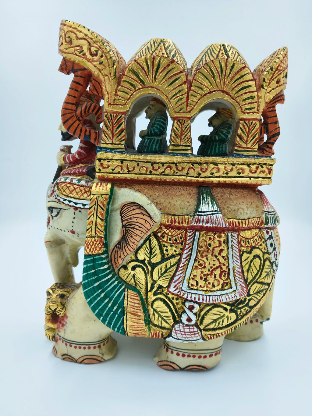 Serpentine elephant ambari sculpture with detailed traditional painting and miniature figures