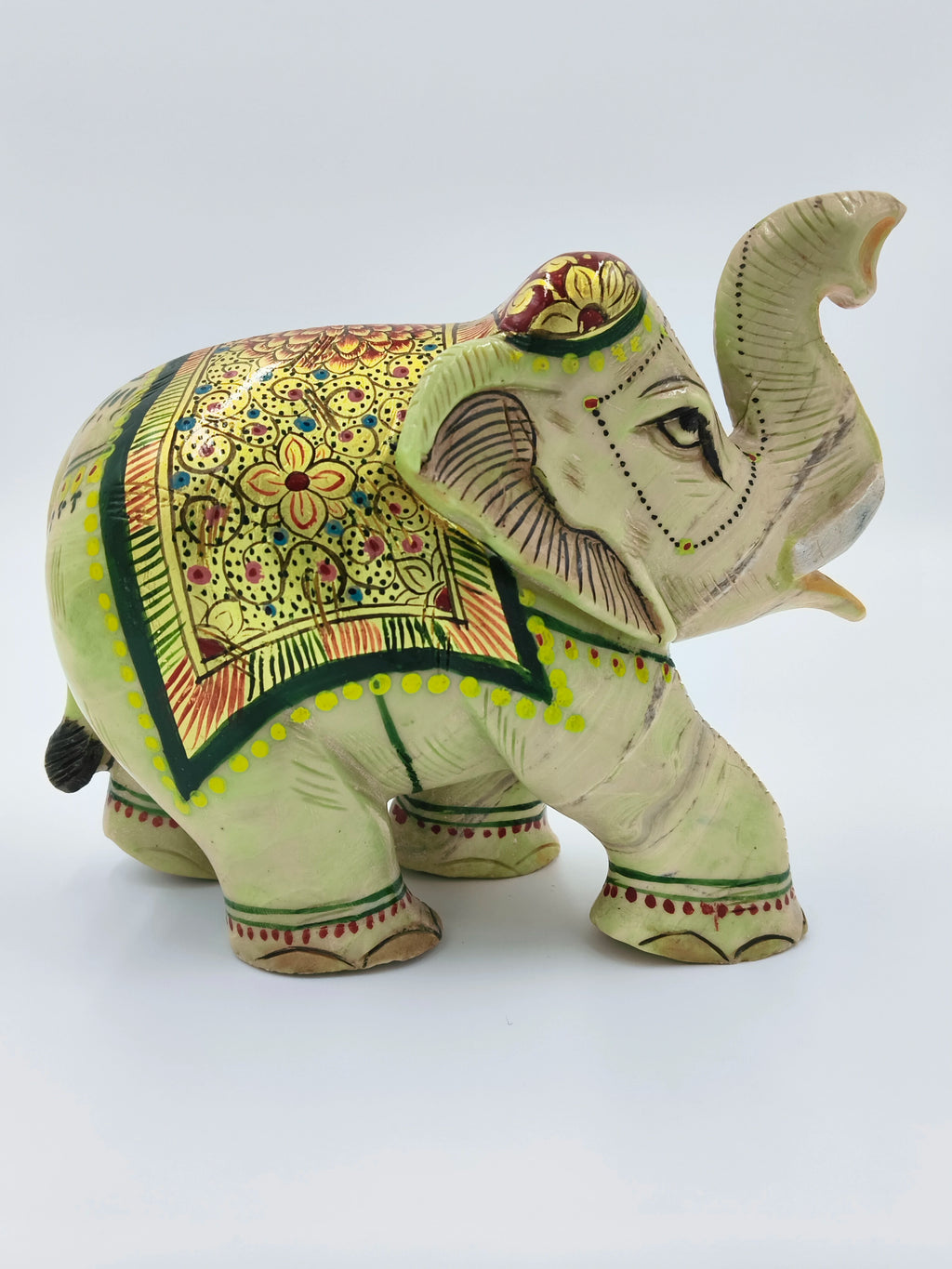 Hand-painted decorative elephant figurine with intricate floral patterns