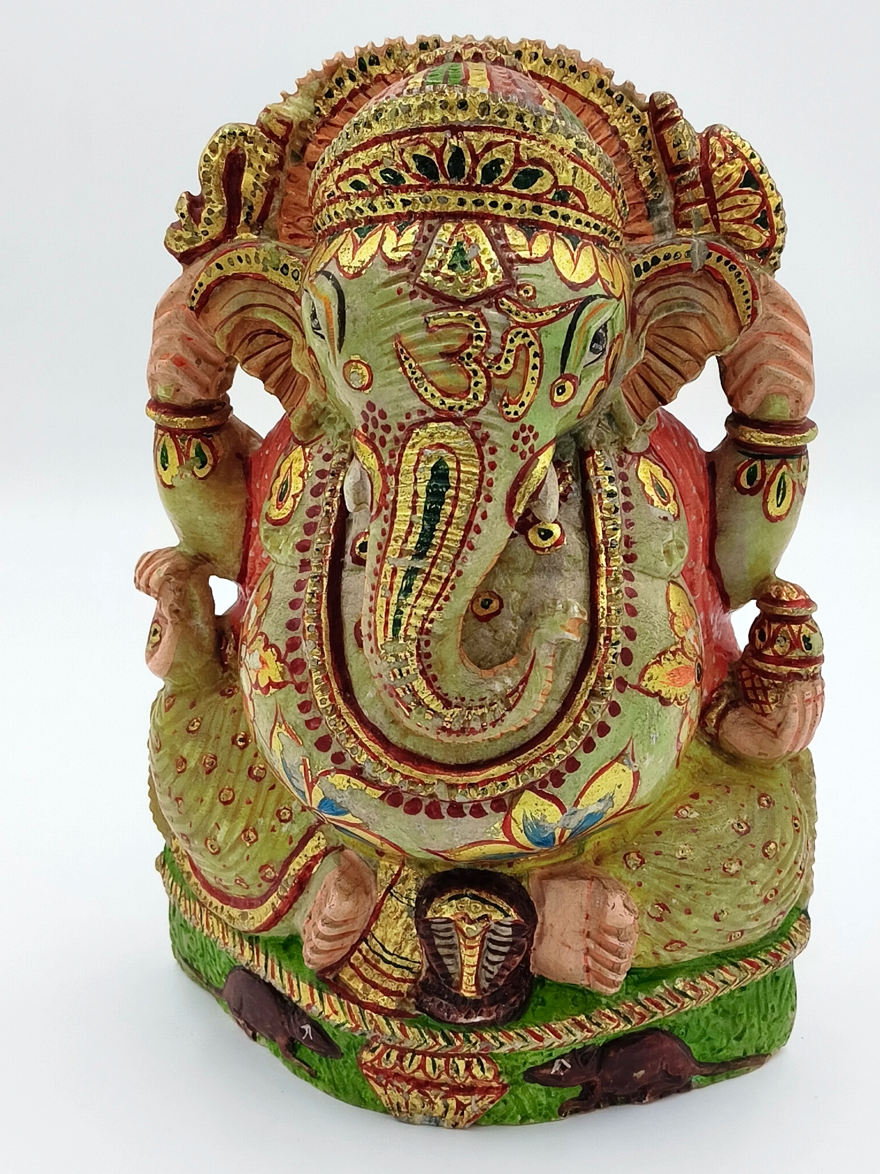 Hand-painted serpentine sculpture of Hindu deity Ganesh with intricate designs