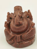 Small sunstone Ganesh sculpture with detailed carving and polished finish