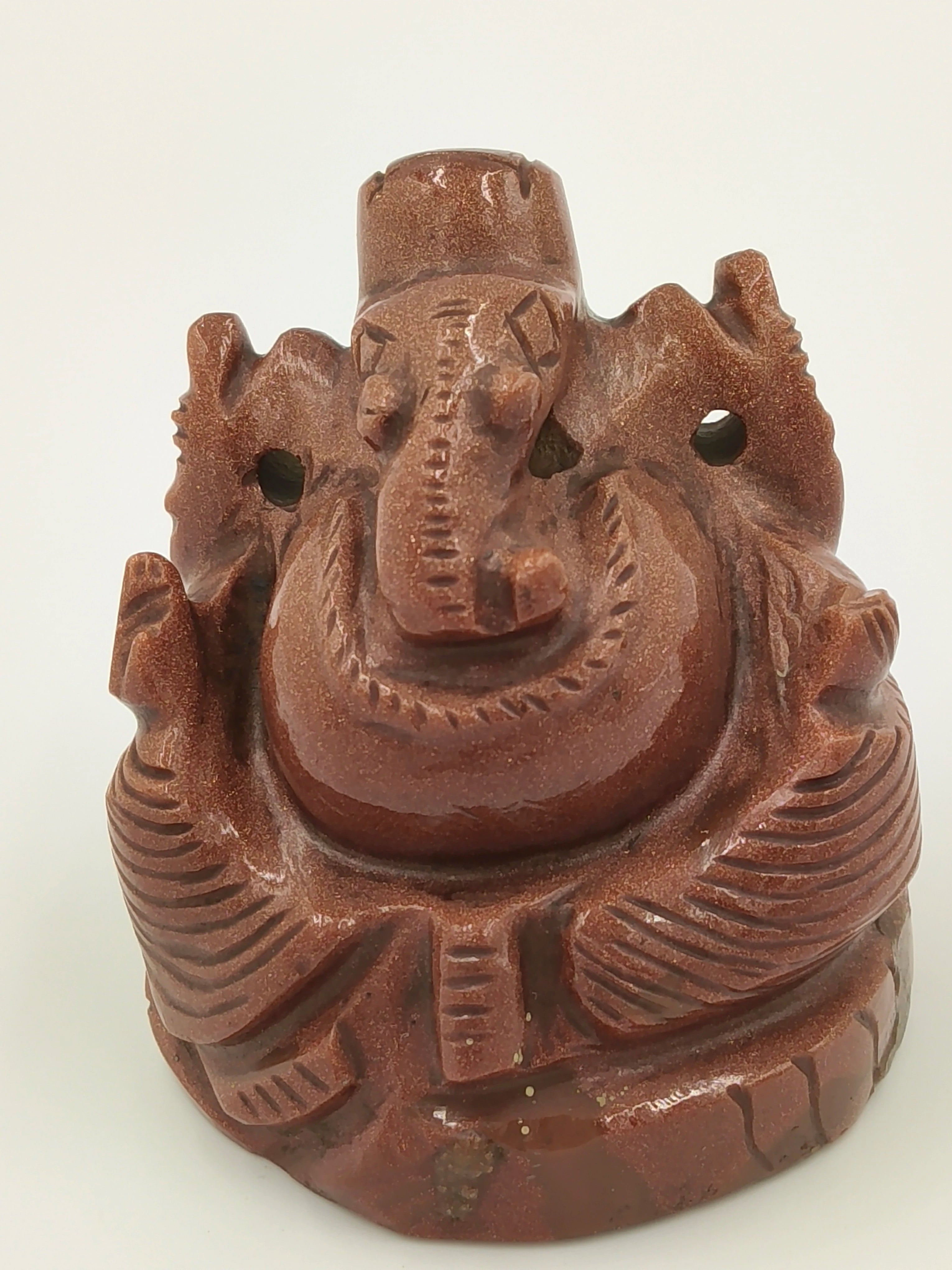Small sunstone Ganesh sculpture with detailed carving and polished finish