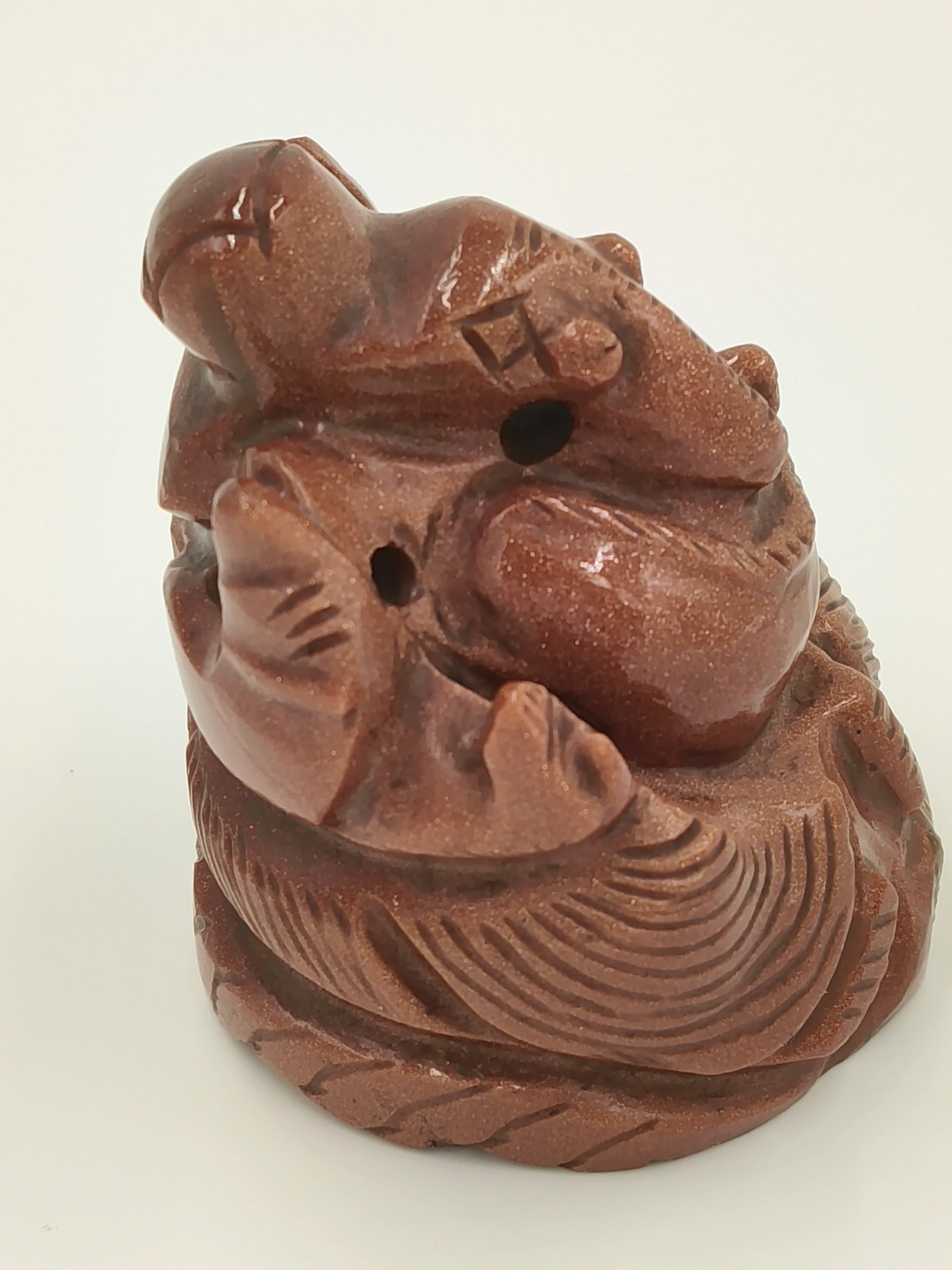 Small 2.5 inch sunstone Ganesh sculpture with intricate carvings