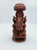 Front view of 7-inch Sunstone Ganesh statue with umbrella