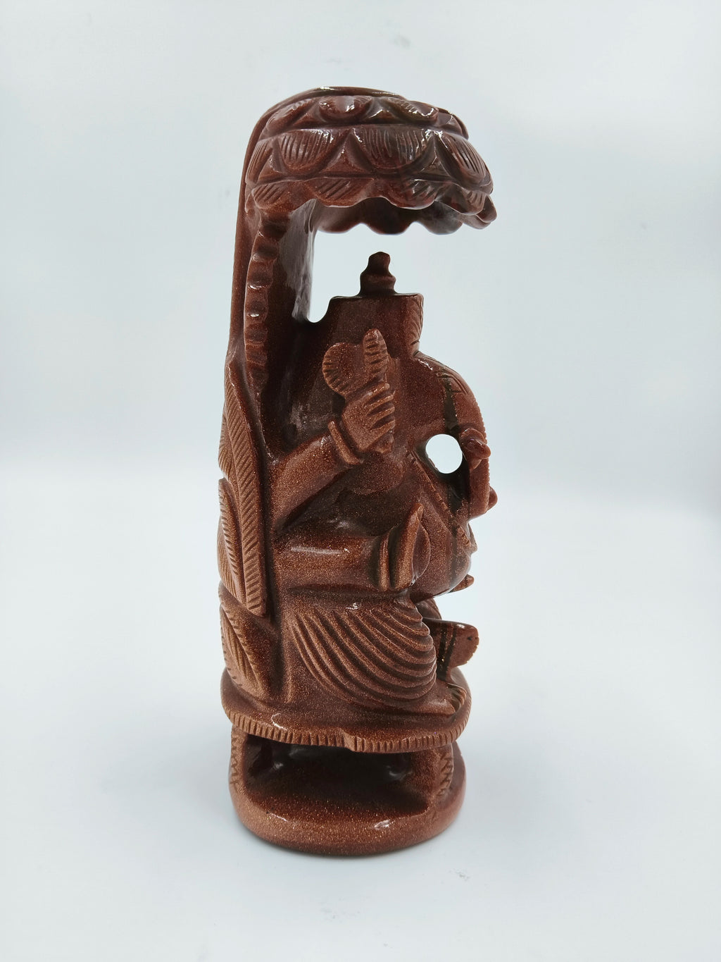Seven inch Sunstone Ganesh sculpture with umbrella, brown stone figurine