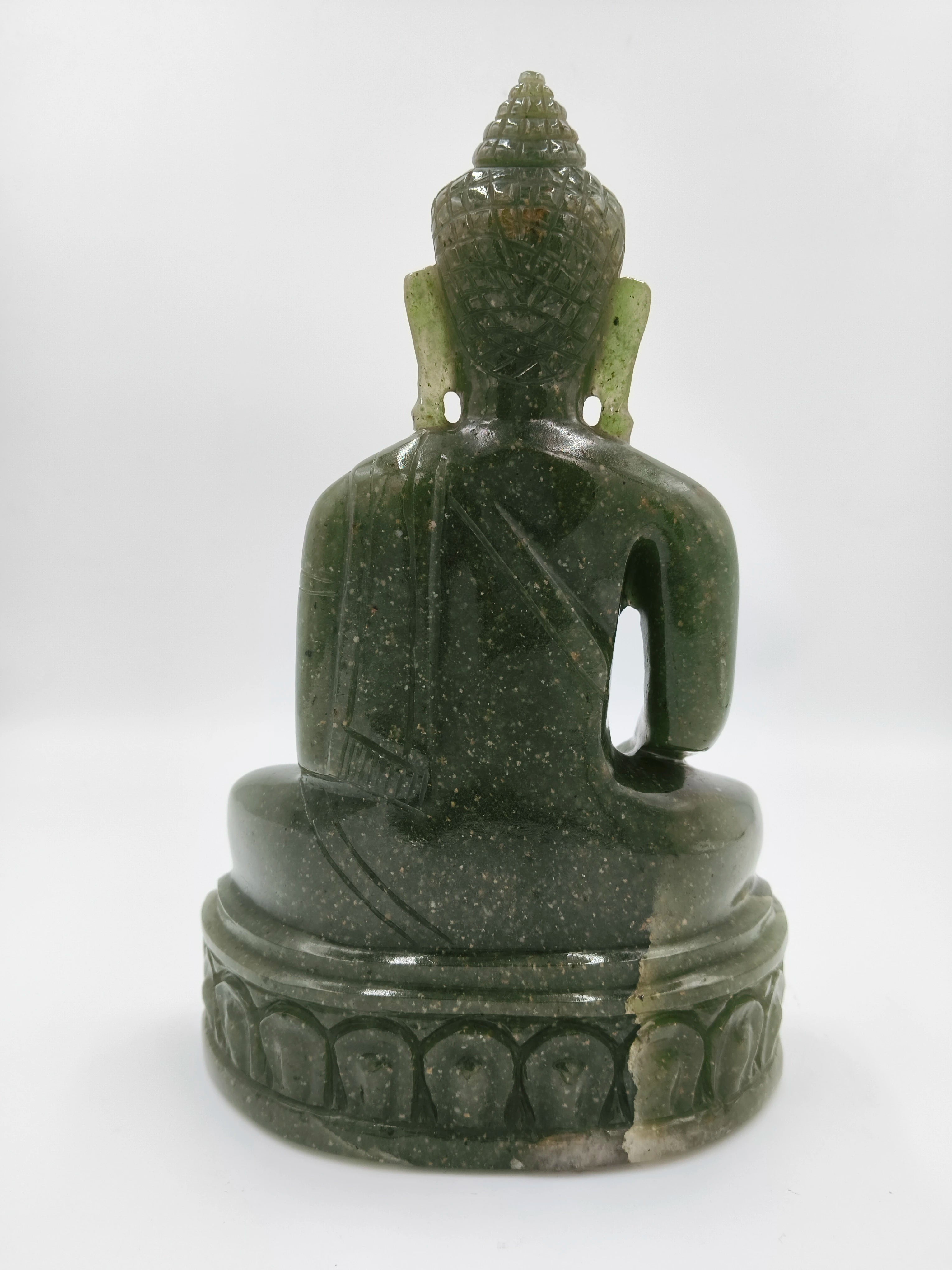 Back view of a 9-inch jade Buddha statue with carved details