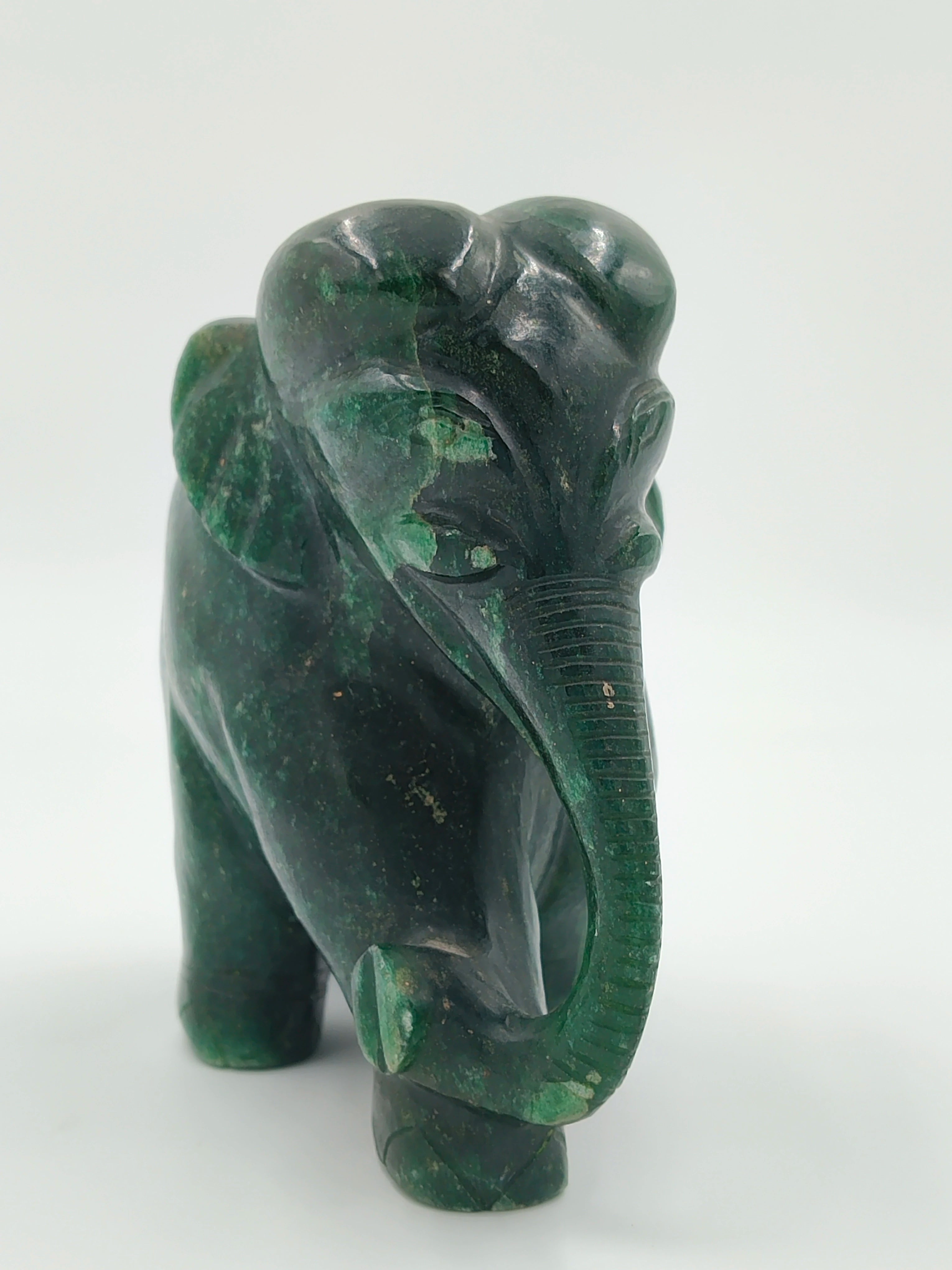 Dark green jade elephant figurine sculpture front view