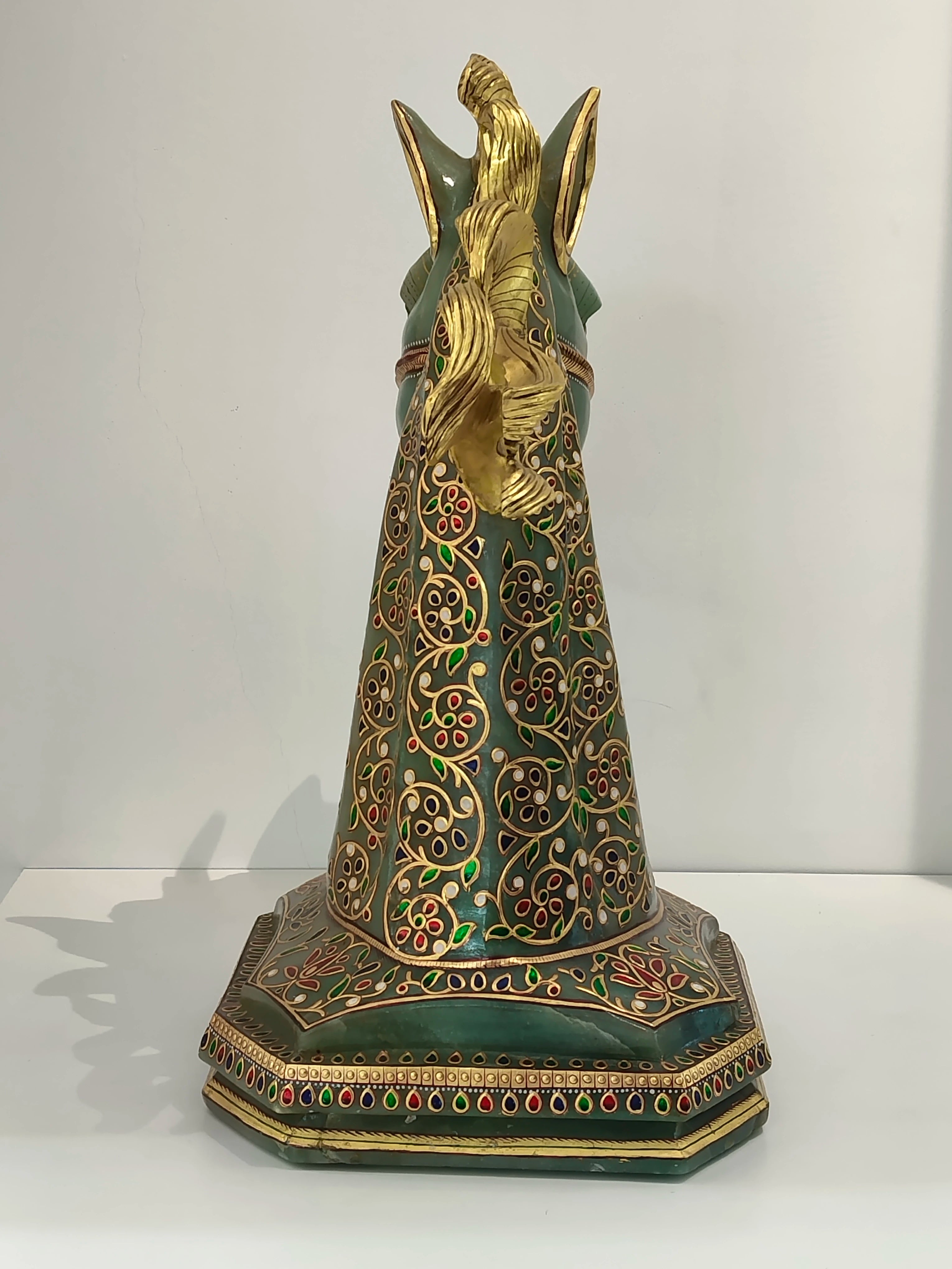 Back view of large jade horse head sculpture with intricate multi-color paintings