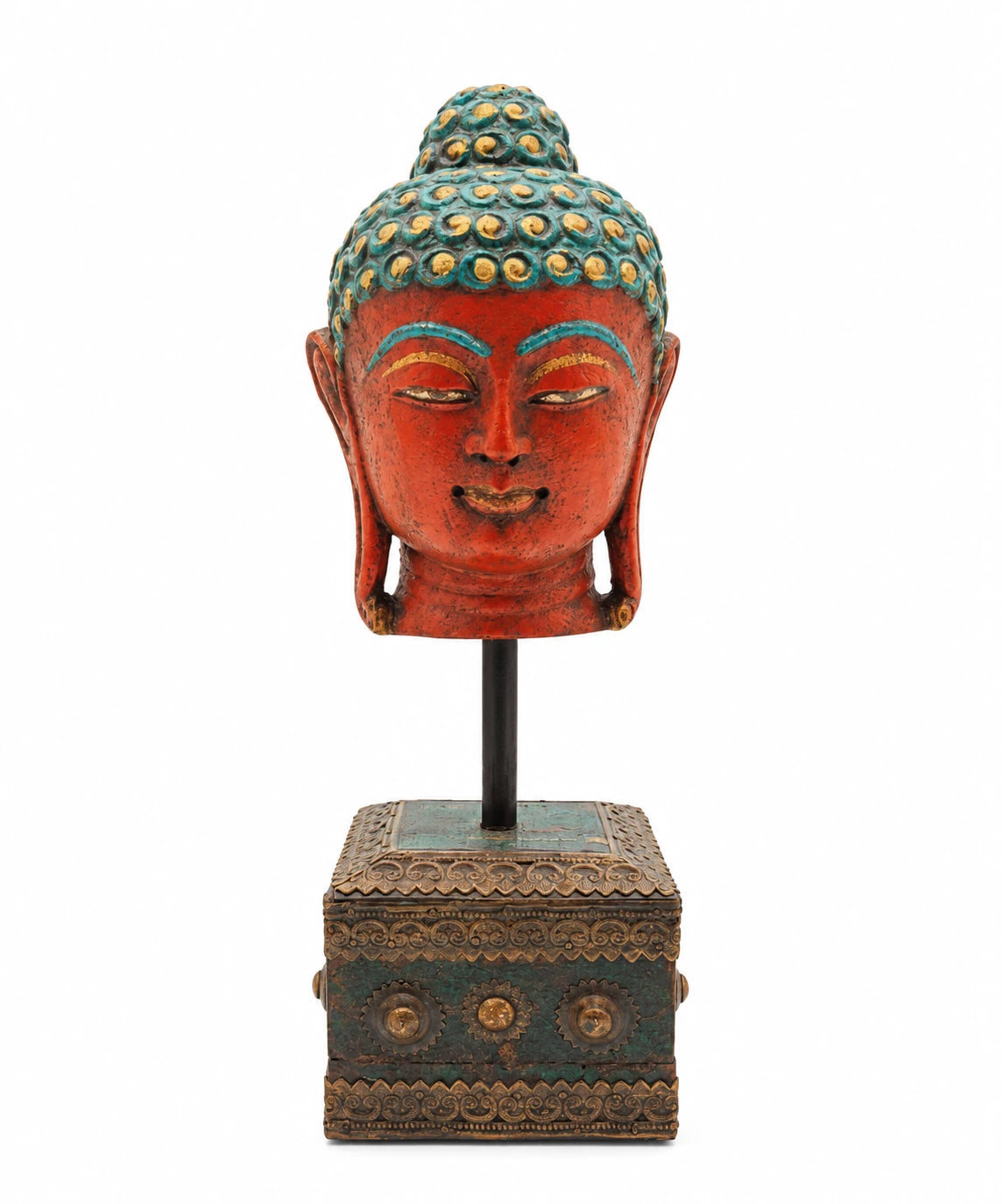 Large stone Buddha head sculpture with red and turquoise paint on decorative base