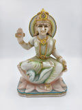 Marble sculpture of goddess Gayatri seated on a lotus with a swan