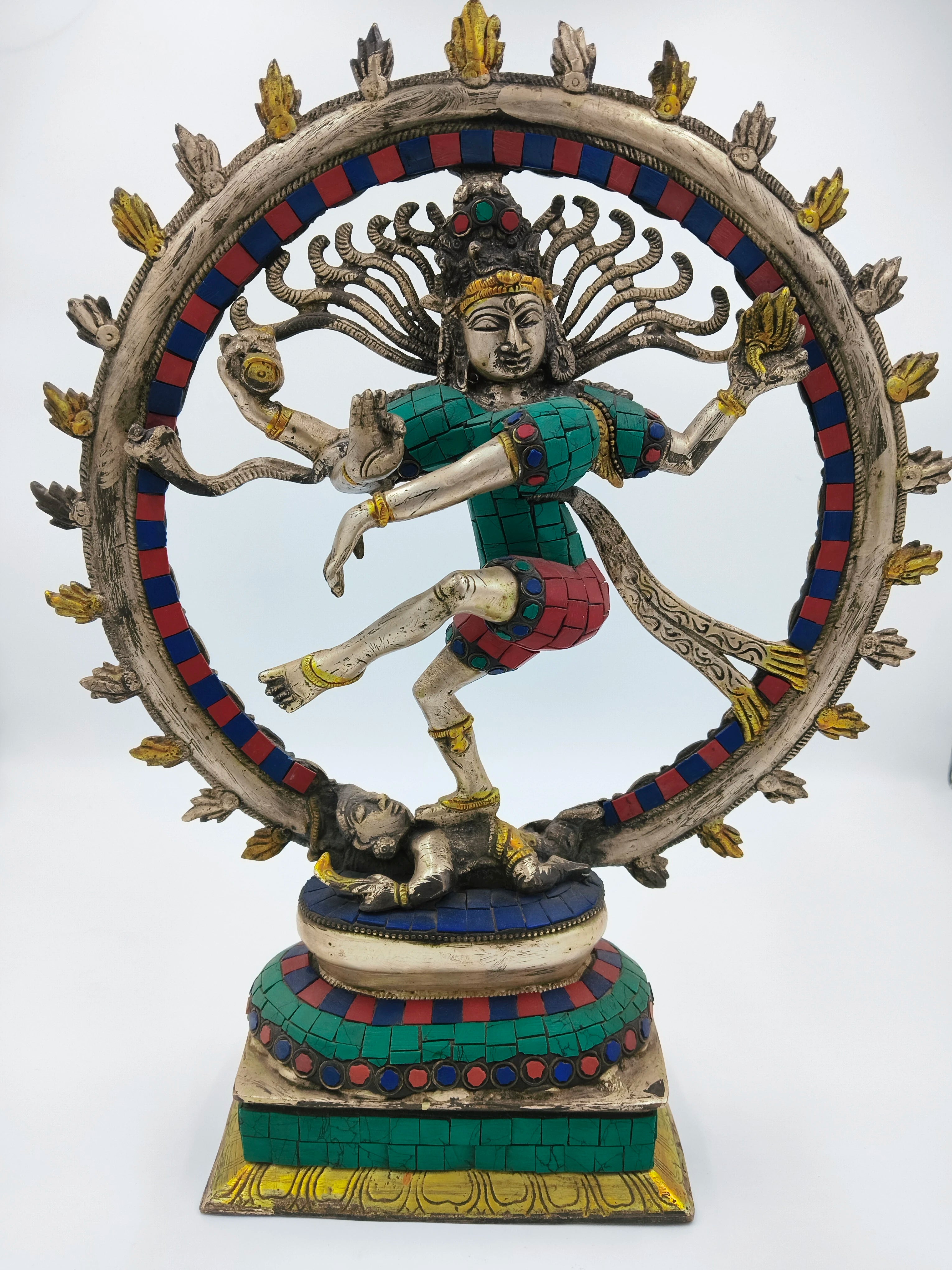 Brass Nataraja sculpture with multicolored inlay on decorative base, front view
