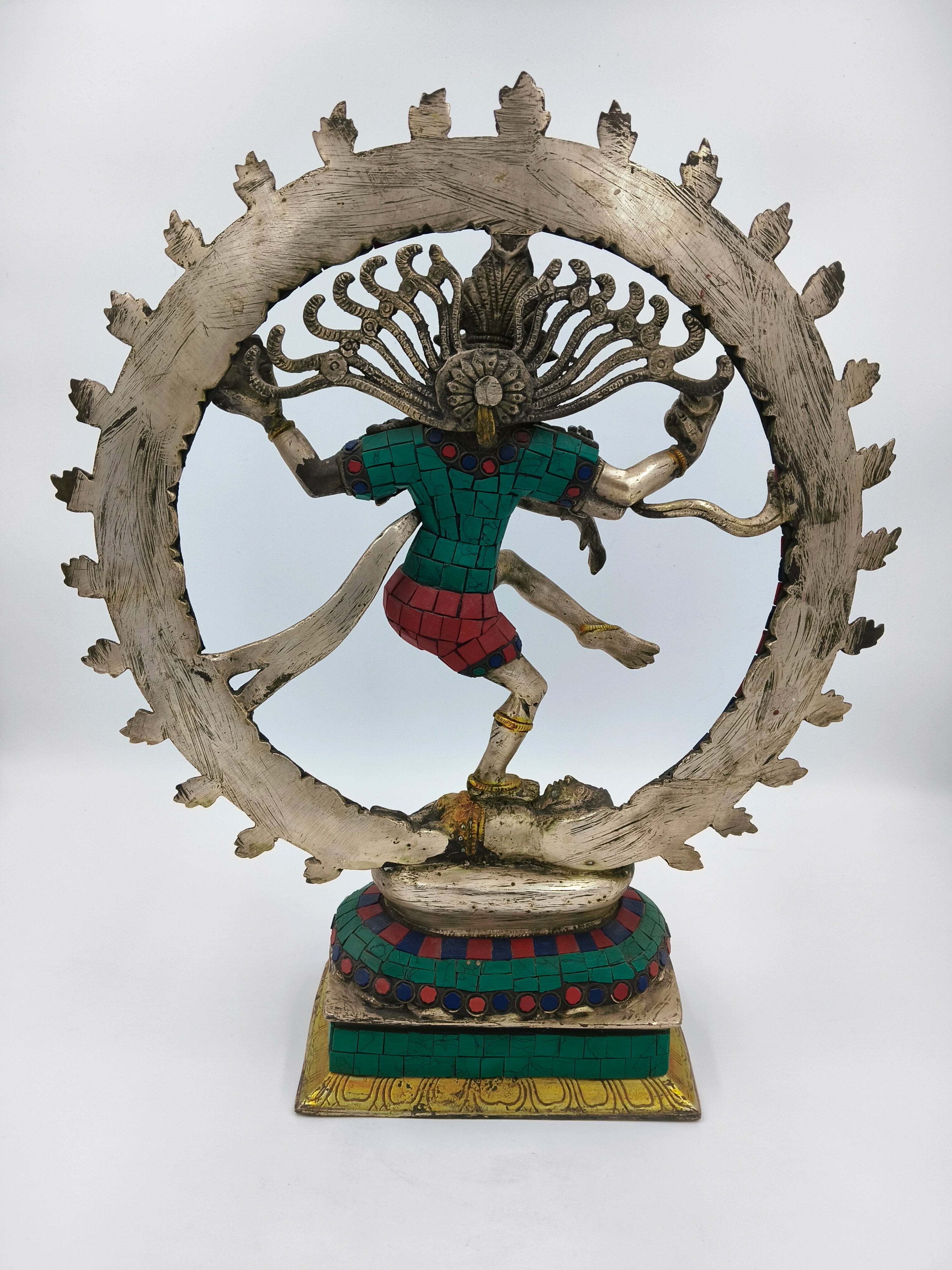 Brass Nataraja sculpture with colorful inlay, dancing pose, circular halo base