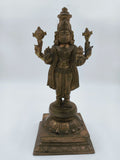Front view of bronze Vishnu statue standing on decorated base