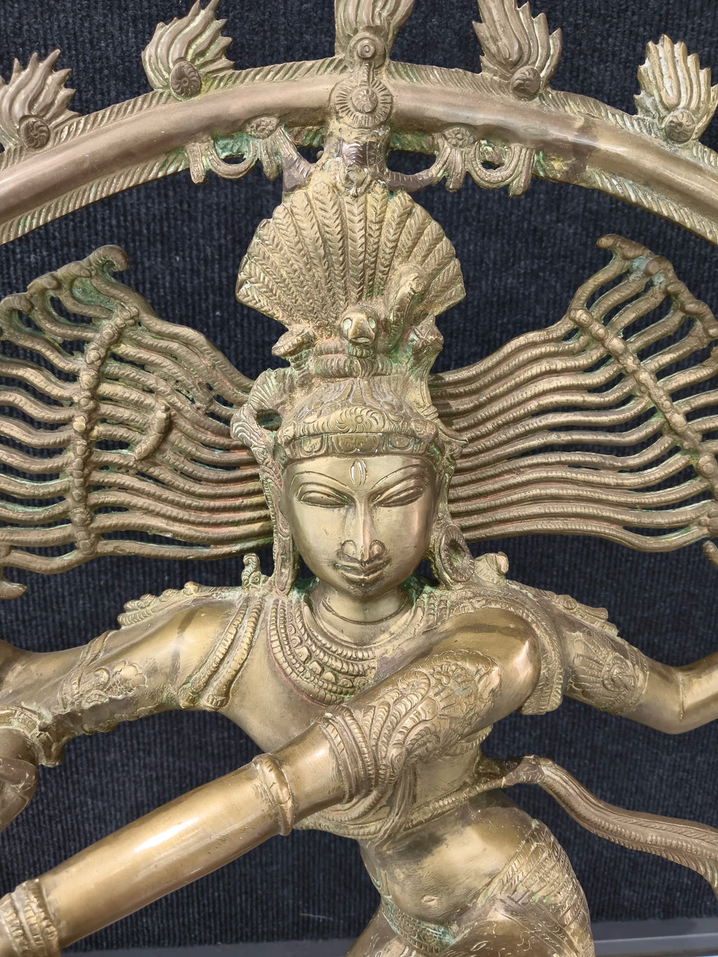 Close-up of large brass Nataraja statue depicting Lord Shiva's cosmic dance